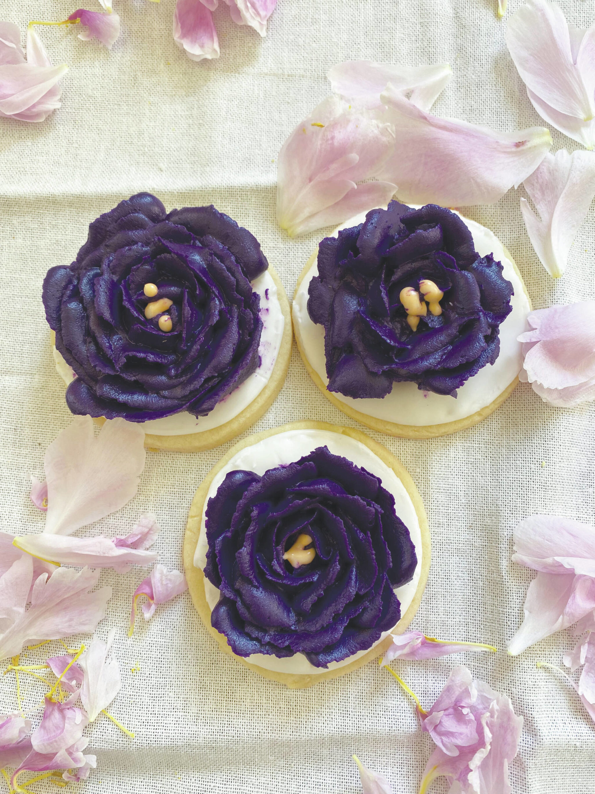 Photo by Tressa Dale/Peninsula Clarion 
Sugar cookies are decorated with flowers of royal icing.