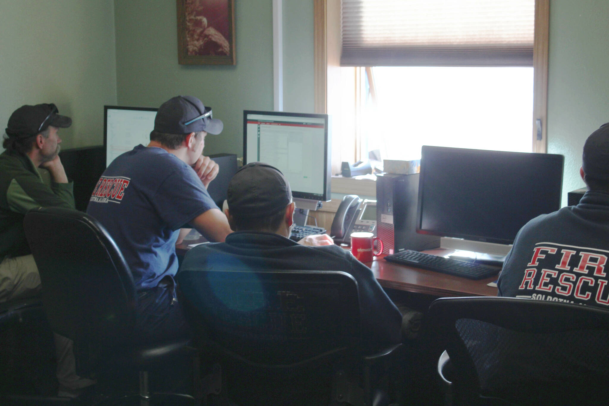 Central Emergency Services personnel share a workspace at the agency’s Station 1 on Tuesday, July 26, 2022, in Soldotna, Alaska. (Ashlyn O’Hara/Peninsula Clarion)