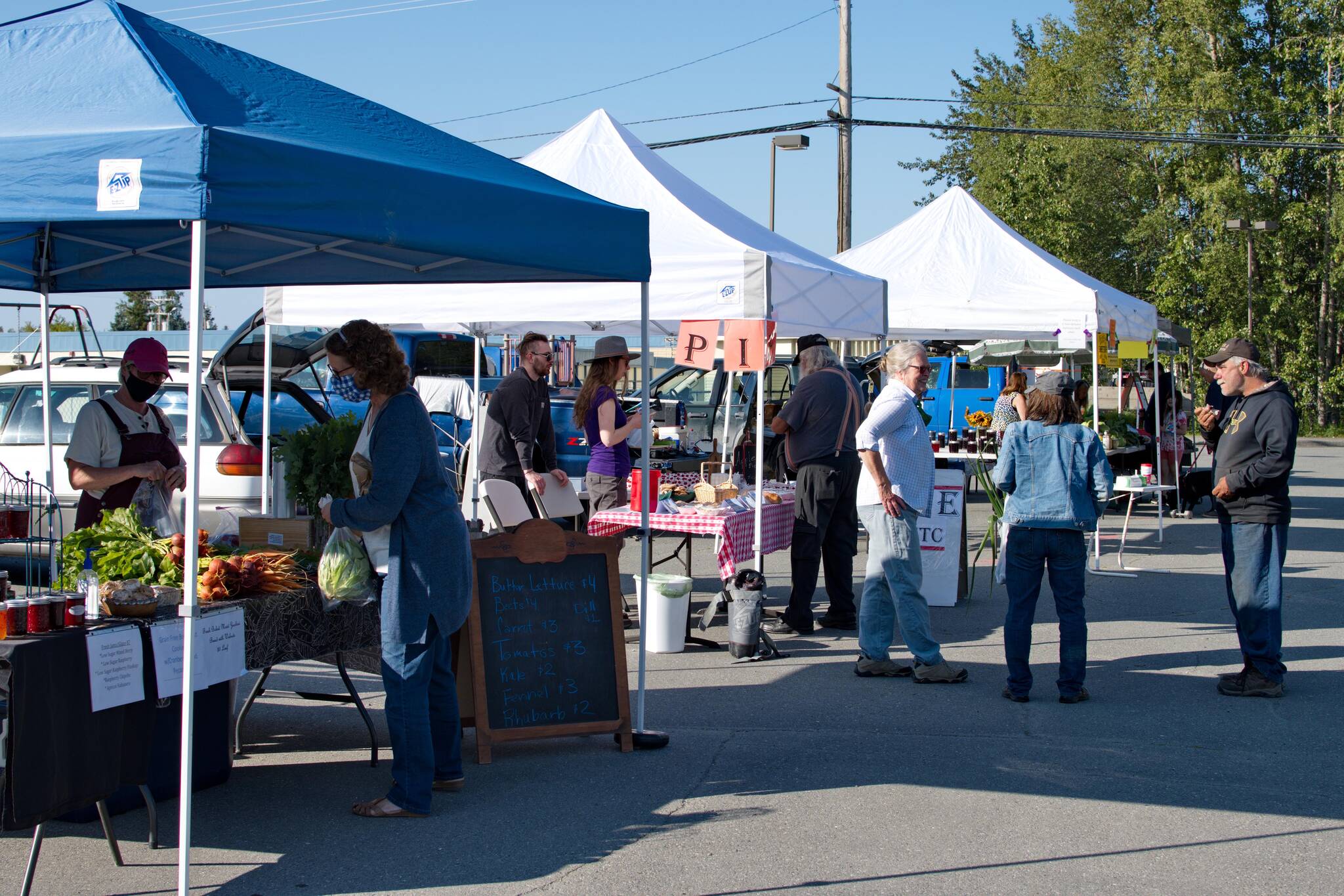 Vendors sell locally grown and crafted products at the Soldotna Saturday Farmers Market during the 2019 season. (Photo provided)