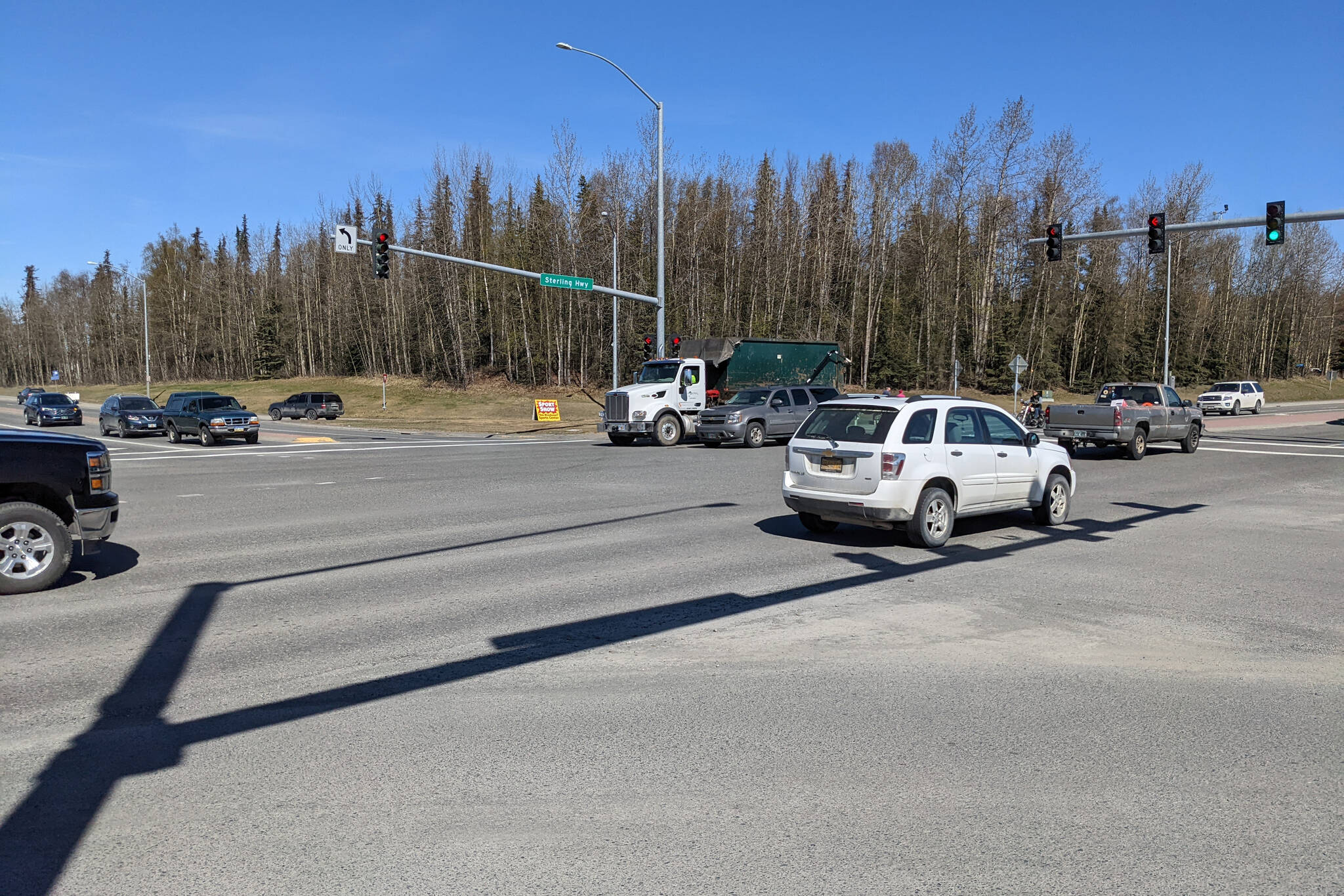 Cars are seen at the intersection of the Kenai Spur and Sterling highways on Saturday, May 7, 2022, in Soldotna, Alaska. Motorists will be unable to turn from the Sterling Highway onto East Redoubt Avenue temporarily next week. (Peninsula Clarion file photo)