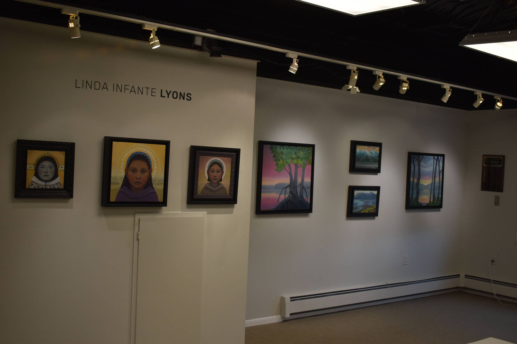 Artwork by Linda Infante Lyons hangs at the Kenai Art Center in Kenai, Alaska on Tuesday, Aug. 2, 2022. This art is part of the Sites Unseen exhiition. (Jake Dye/Peninsula Clarion)