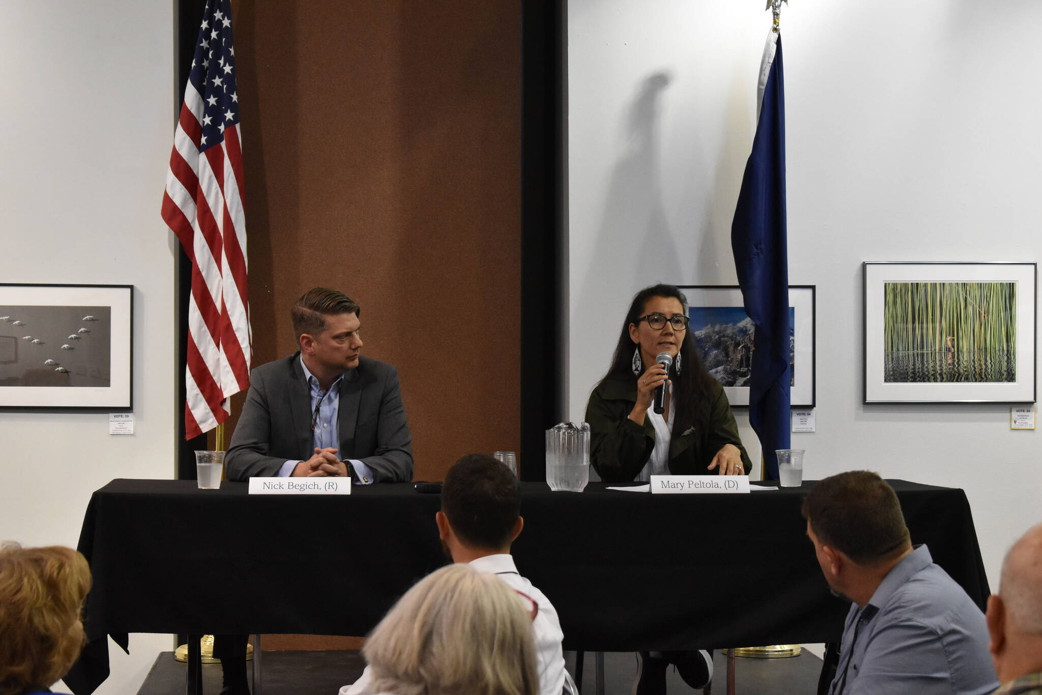 Nick Begich and Mary Peltola answer questions at a candidate forum at the Kenai Visitor Center on Aug. 3, 2022, in Kenai, Alaska. (Peninsula Clarion/Jake Dye)