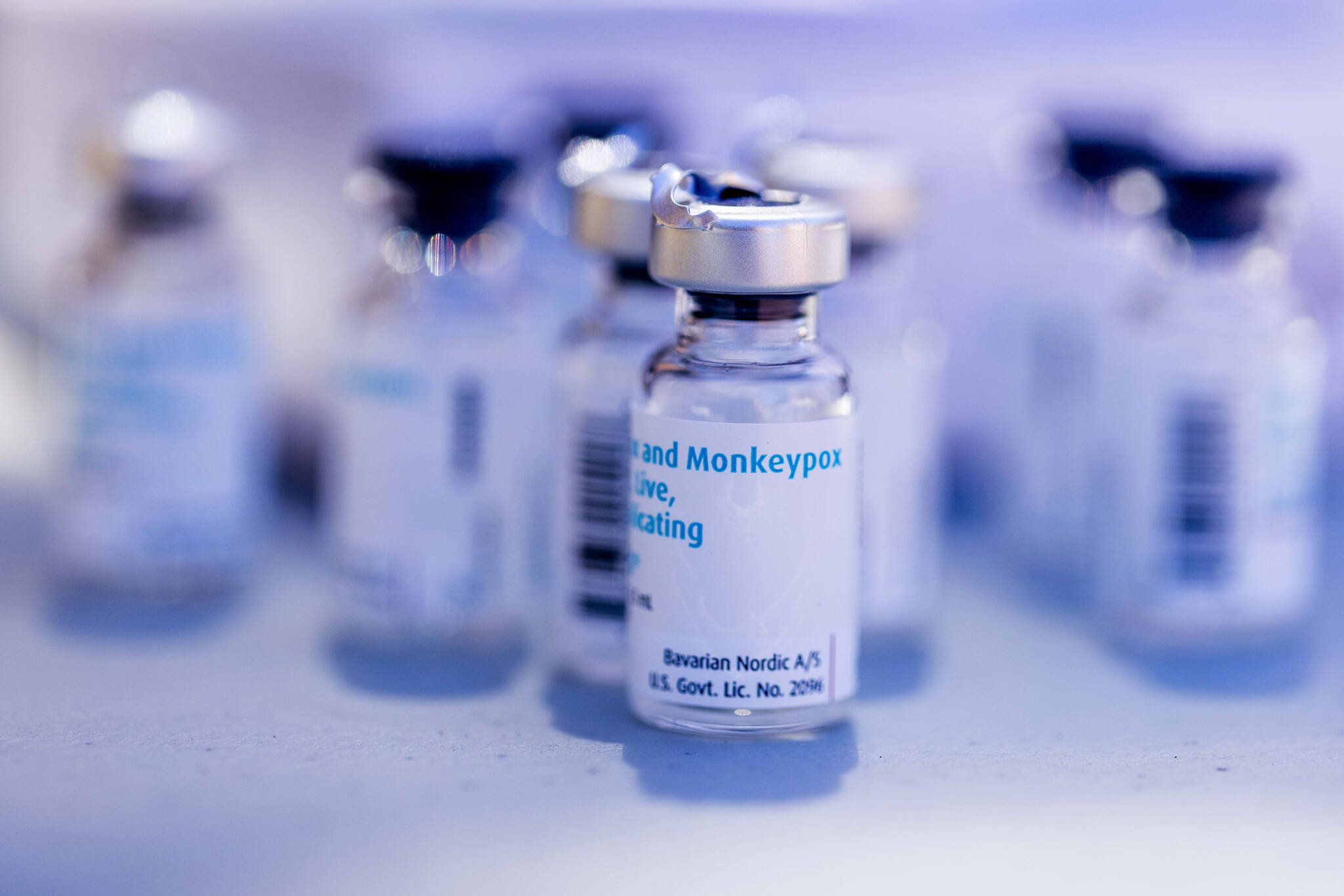 Vials of empty monkeypox vaccines sit at a table at Seattle Central College in Seattle, Saturday, Aug. 6, 2022. (Daniel Kim/The Seattle Times via AP)