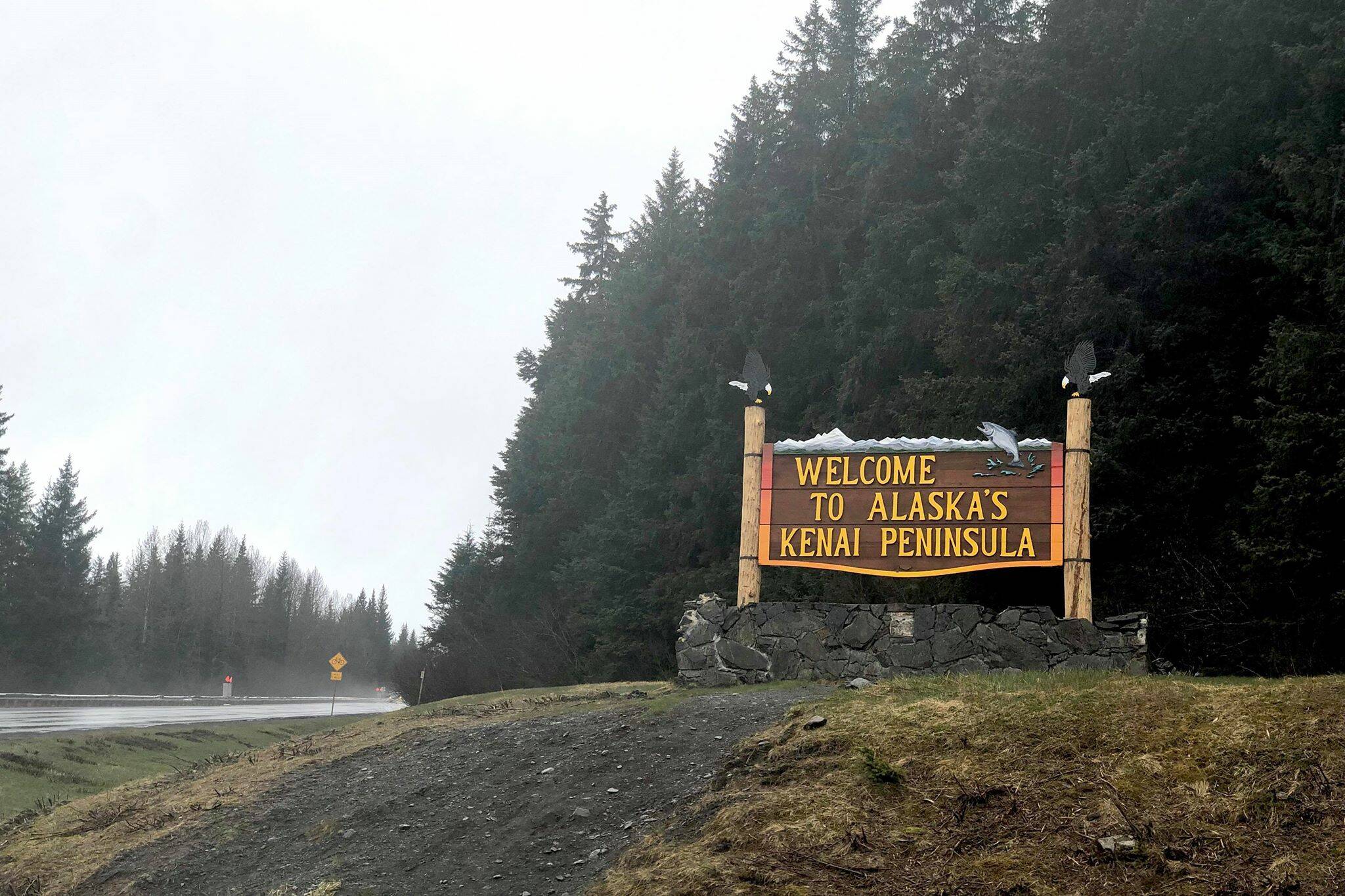 The borough’s welcome sign greets drivers as they enter the Kenai Peninsula on Milepost 75 of the Seward Highway, on Sunday, May 5, 2019, near Turnagain Pass, Alaska. (Photo by Victoria Petersen/Peninsula Clarion)