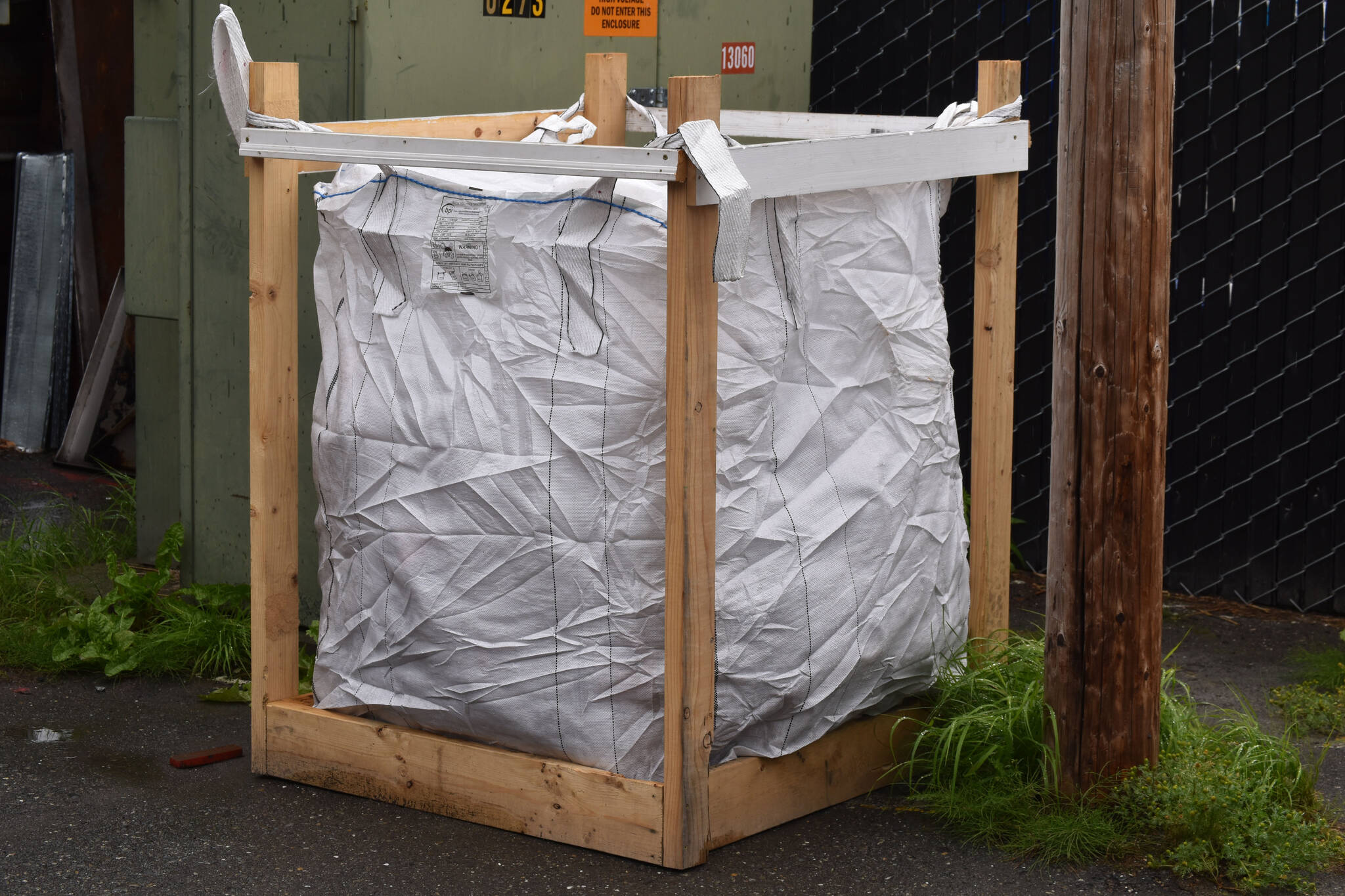 A recycling super sack behind The Goods + Sustainable Grocery in Soldotna, Alaska, on Aug. 11, 2022. (Jake Dye/Peninsula Clarion)