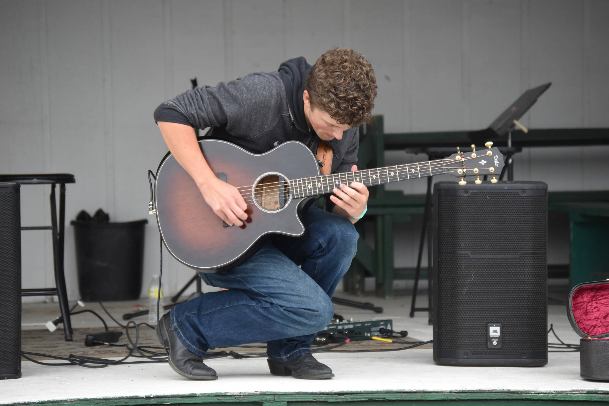 Homer youth Silas Jones performs on the Inlet Stage at the Kenai Peninsula Fair on Aug. 12, 2022, in Ninilchik, Alaska. (Jake Dye/Peninsula Clarion)