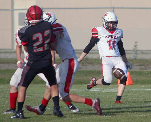 Kenai Central’s Wade James punts against Eielson on Friday, Aug. 12, 2022, at Buck Nystrom Field on Eielson Air Force Base. (Photo by Jeff Olsen/Fairbanks Daily News-Miner)