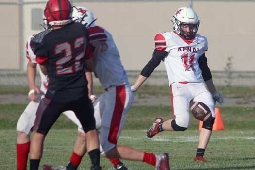 Kenai Central's Wade James punts against Eielson on Friday, Aug. 12, 2022, at Buck Nystrom Field on Eielson Air Force Base. (Photo by Jeff Olsen/Fairbanks Daily News-Miner)