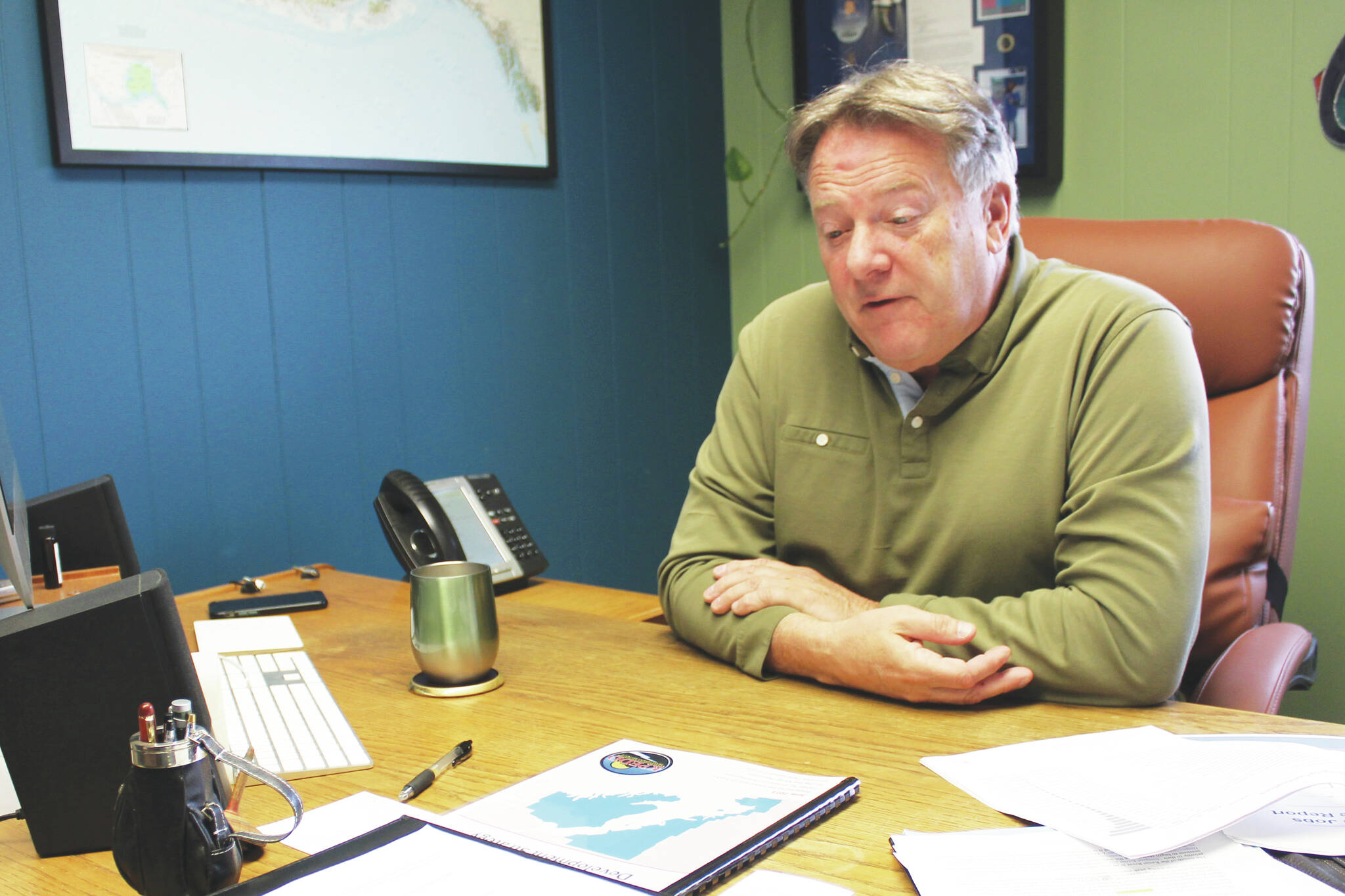 KPEDD Executive Director Tim Dillon sits in his office on Thursday, Sept. 30, 2021 north of Kenai, Alaska. (Ashlyn O’Hara/Peninsula Clarion)