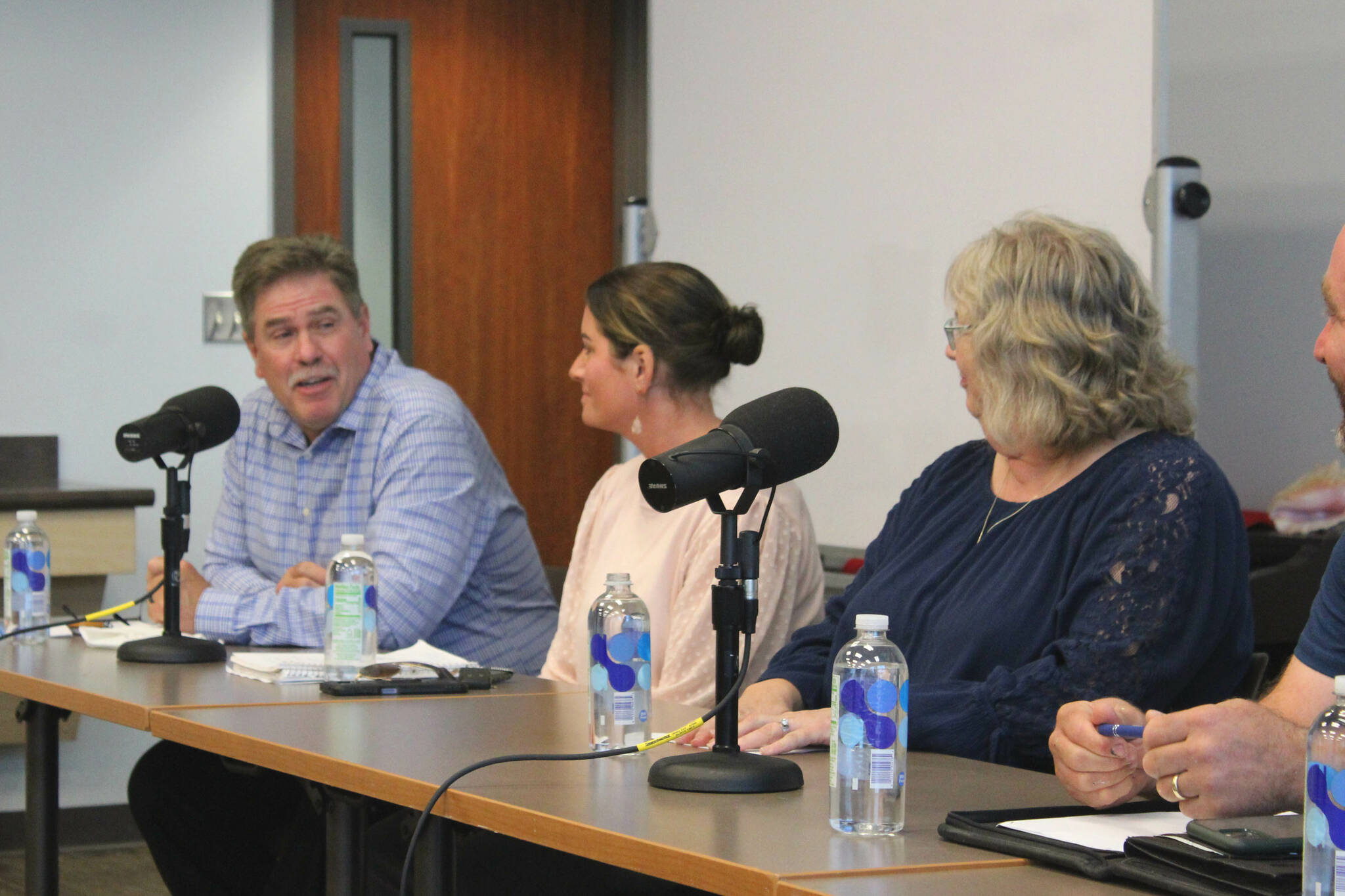 From left, Kenai city mayoral candidates Brian Gabriel and Teea Winger, as well as council candidate Victoria Askin participate in a candidate forum at the Soldotna Public Library on Monday, Aug. 29, 2022 in Soldotna, Alaska. (Ashlyn O’Hara/Peninsula Clarion)