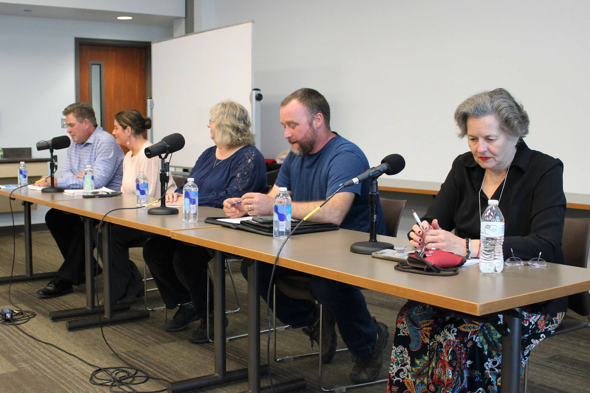 From left, Kenai city mayoral candidates Brian Gabriel and Teea Winger, as well as council candidates Victoria Askin, Alex Douthit and Glenese Pettey participate in a candidate forum at the Soldotna Public Library on Monday, Aug. 29, 2022 in Soldotna, Alaska. (Ashlyn O’Hara/Peninsula Clarion)