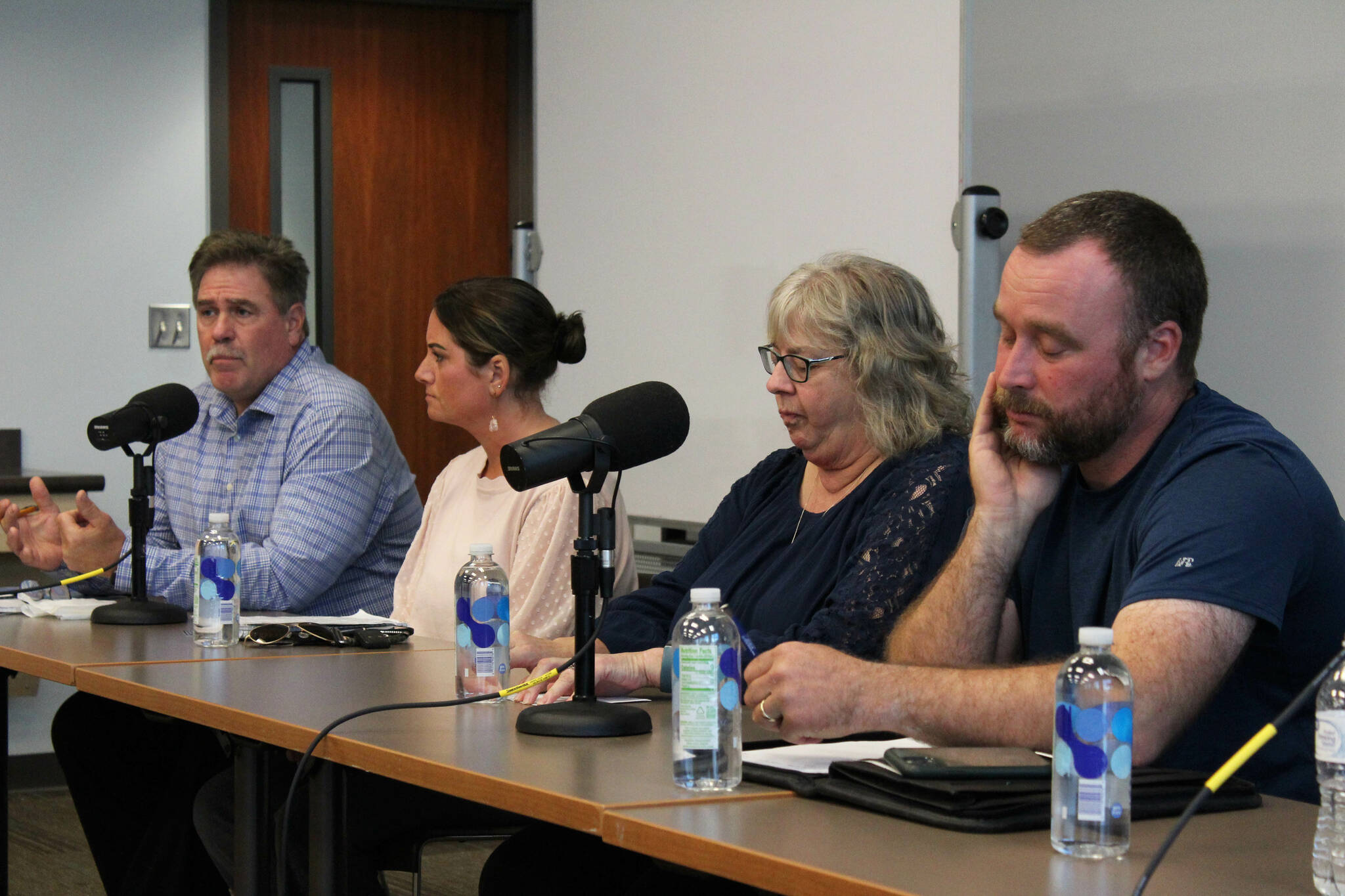 From left, Kenai city mayoral candidates Brian Gabriel and Teea Winger, as well as council candidates Victoria Askin and Alex Douthit participate in a candidate forum at the Soldotna Public Library on Monday, Aug. 29, 2022 in Soldotna, Alaska. (Ashlyn O’Hara/Peninsula Clarion)