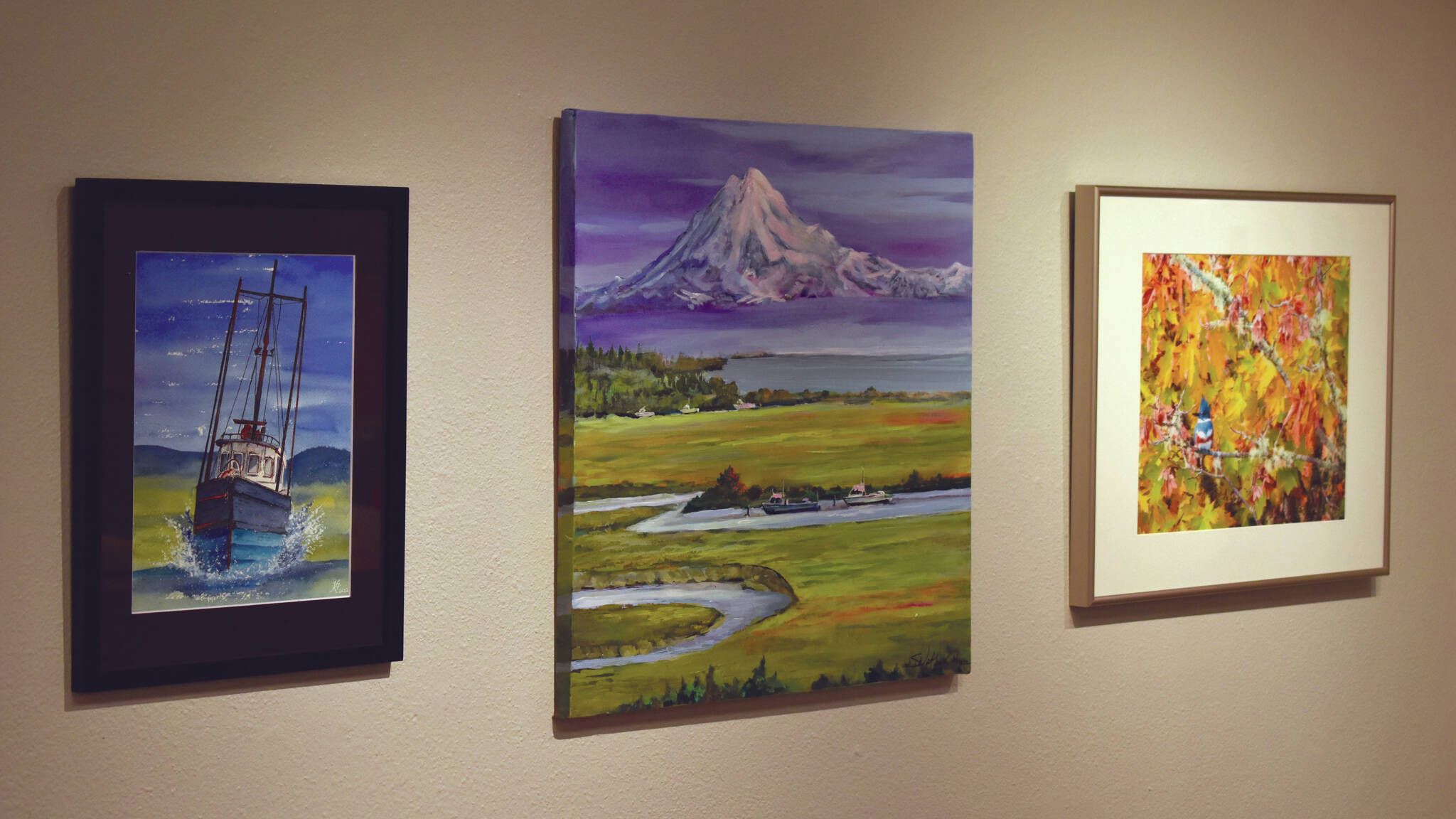 Jake Dye / Peninsula Clarion 
Artwork donated for the Harvest Auction hangs at the Kenai Art Center on Tuesday in Kenai.