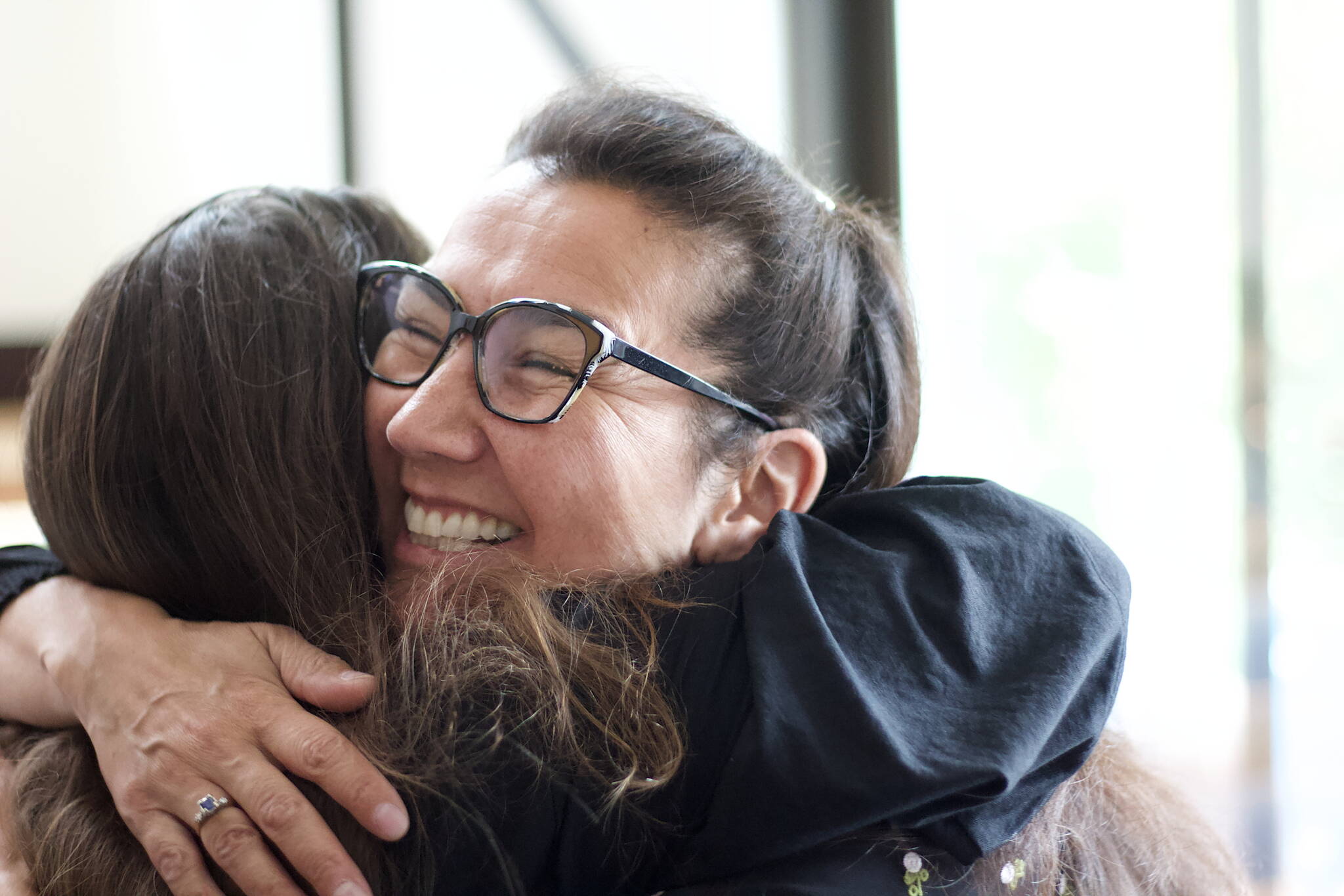 Democratic U.S. House Candidate Mary Peltola hugs a supporter during a campaign event in Juneau. After ranked choice voting tabulation, Peltola won the special election to fill Alaska’s lone seat in the U.S. House of Representatives. Peltola is the first Alaska Native to be elected to U.S. Congress. (Mark Sabbatini / Juneau Empire)