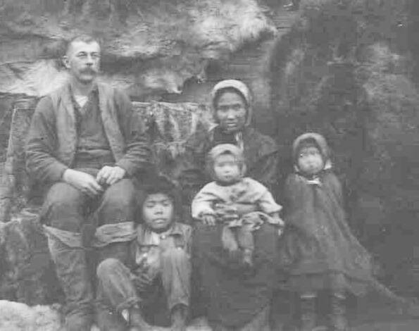 George W. Palmer (left), the namesake for the city in the Matanuska Valley and the creek near Hope, poses here with his family in 1898 in the Knik area. Palmer became a business partner of Bill Dawson in Kenai in the last years of Dawson’s life. (Photo from the Alaska Digital Archives)