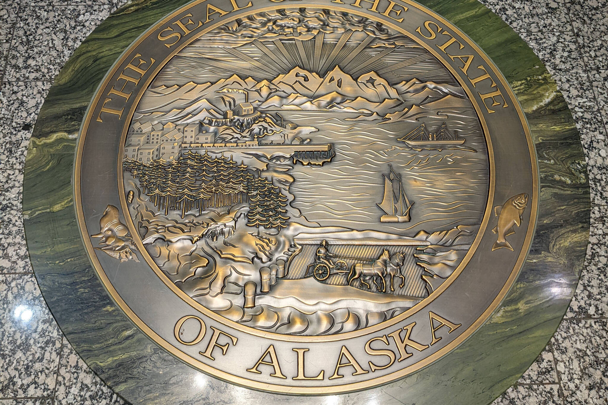 The Alaska state seal can be seen at the Ted Stevens Anchorage International Airport in Anchorage, Alaska, in February 2022. (Peninsula Clarion file)