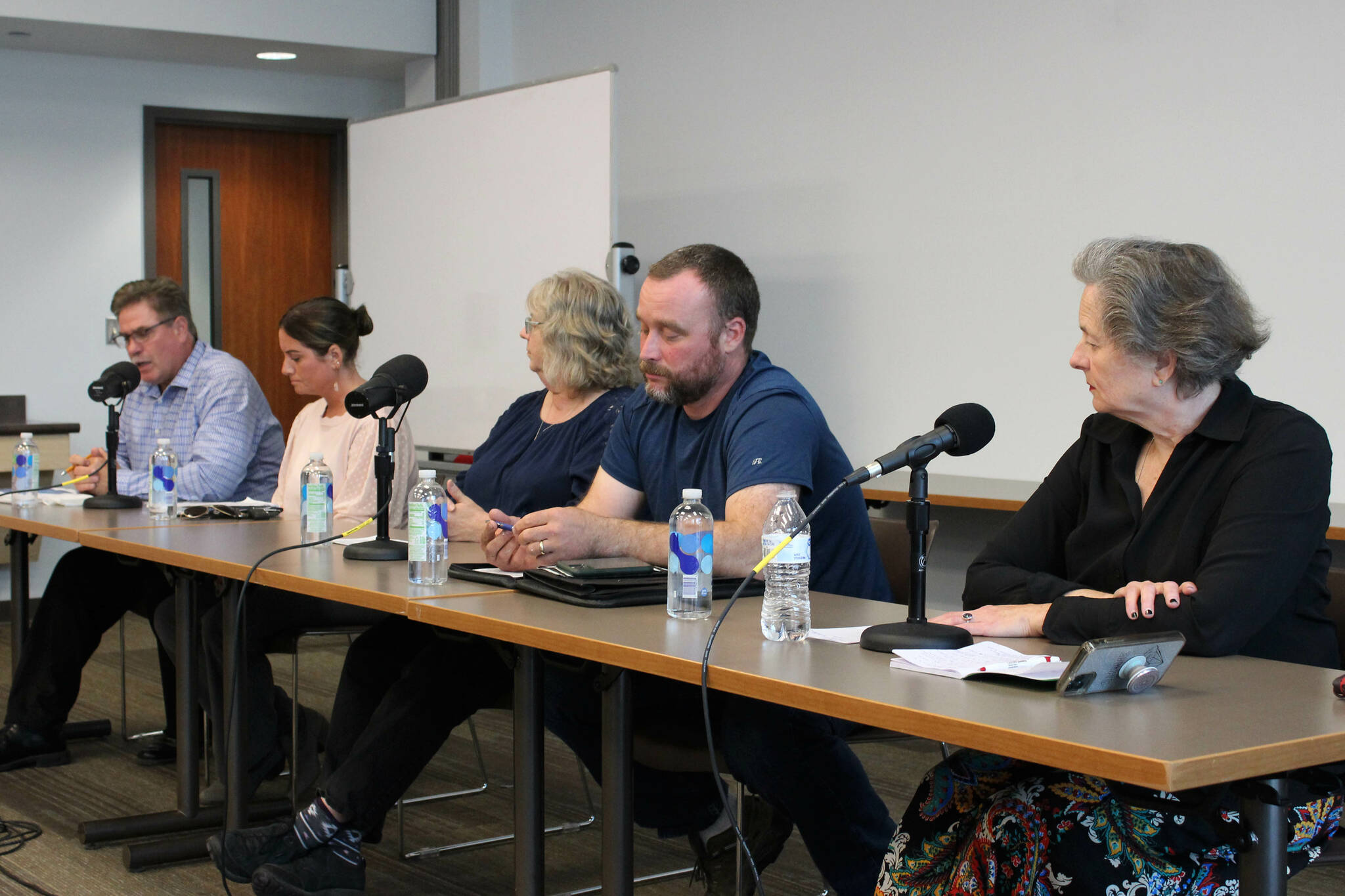 From left, Kenai city mayoral candidates Brian Gabriel and Teea Winger, as well as council candidates Victoria Askin, Alex Douthit and Glenese Pettey participate in a candidate forum at the Soldotna Public Library on Monday, Aug. 29, 2022, in Soldotna, Alaska. The Peninsula Clarion and KDLL 91.9 FM, in partnership with the Central Kenai Peninsula League of Women Voters are hosting a series of election forums Mondays from 6-7 p.m. through Oct. 31 at the Soldotna library. (Ashlyn O’Hara/Peninsula Clarion)