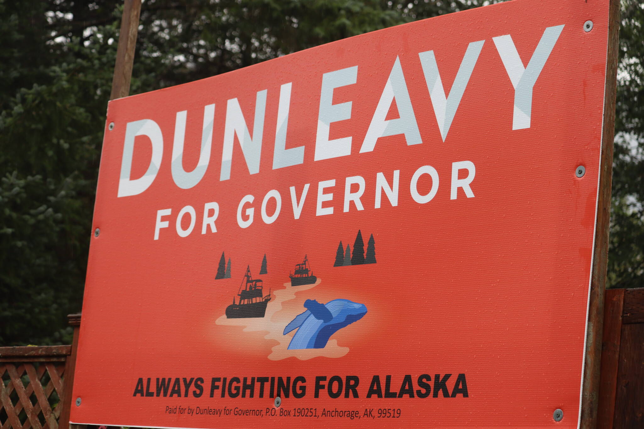 A campaign sign promoting Gov. Mike Dunleavy’s reelection campaign stands in Juneau. Two nonprofits on Tuesday filed a complaint with Alaska Public Offices Commission against Dunleavy and others connected to his campaign. The complaint alleges a series of “egregious campaign finance violations.” (Jonson Kuhn / Juneau Empire Photo)