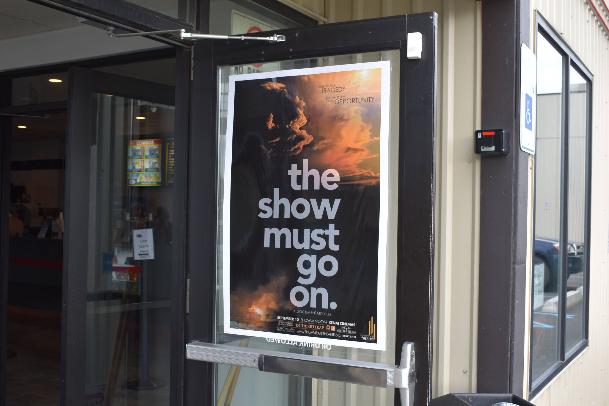 A poster for “The Show Must Go On” is displayed at the Kenai Cinema on Tuesday, Sept. 6, 2022, in Kenai, Alaska. (Jake Dye/Peninsula Clarion)