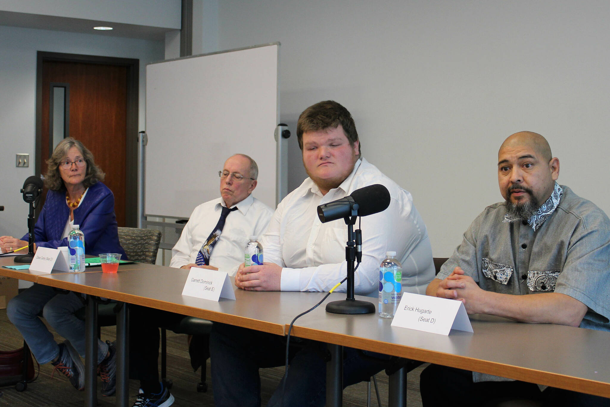 From left, Soldotna City Council candidates Lisa Parker, Dave Carey, Garrett Dominick and Erick Hugarte participate in a candidate forum at the Soldotna Public Library on Tuesday, Sept. 6, 2022 in Soldotna, Alaska. (Ashlyn O’Hara/Peninsula Clarion)