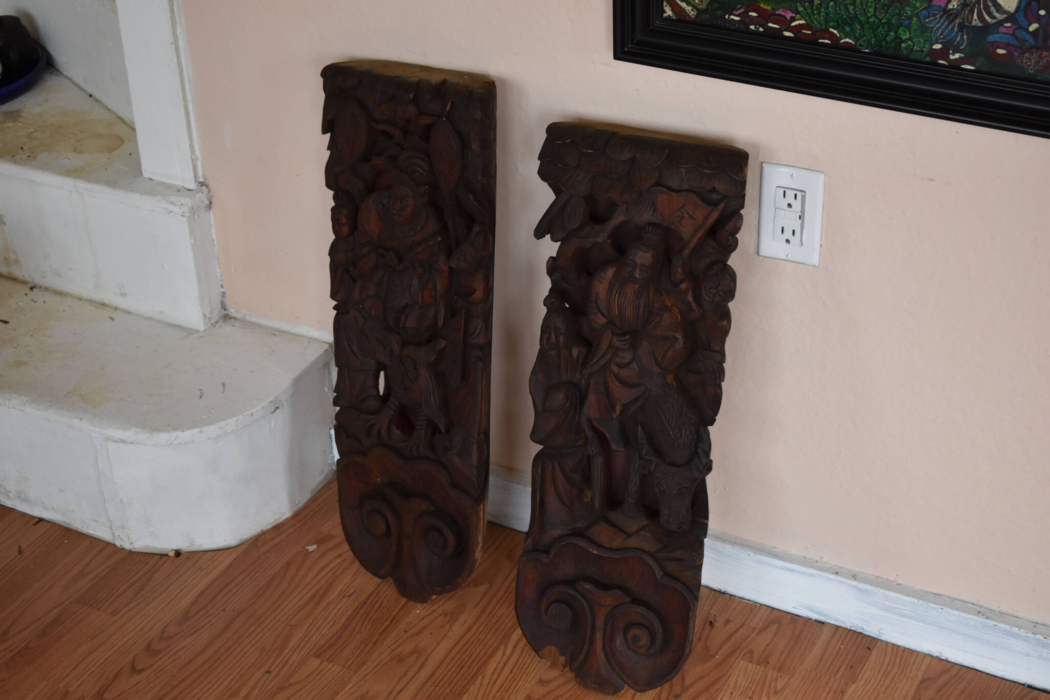 Two 300-year-old carvings are featured in Kathy Matta’s gallery in Soldotna, Alaska, on Wednesday, Sept. 7, 2022. (Jake Dye/Peninsula Clarion)