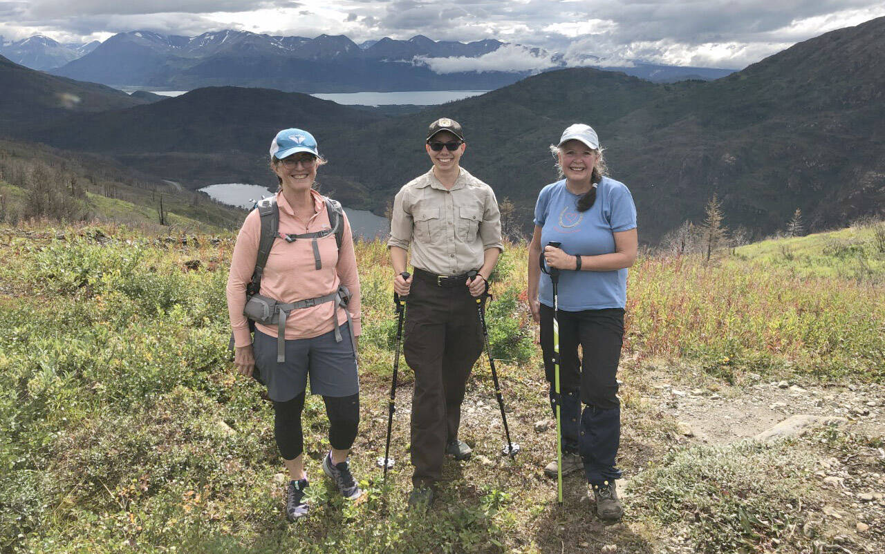 Jaimie Musen and visitors on a Skyline Trail guided hike after a rainstorm. (Photo courtesy of USFWS)