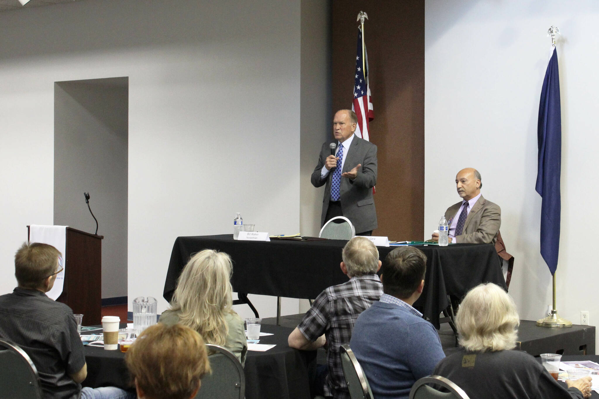 Alaska gubernatorial candidates Bill Walker, left, and Les Gara participate in a candidate forum hosted by the Kenai and Soldotna chambers of commerce at the Kenai Chamber of Commerce and Visitor Center on Wednesday, Sept. 7, 2022, in Kenai, Alaska. (Ashlyn O’Hara/Peninsula Clarion)