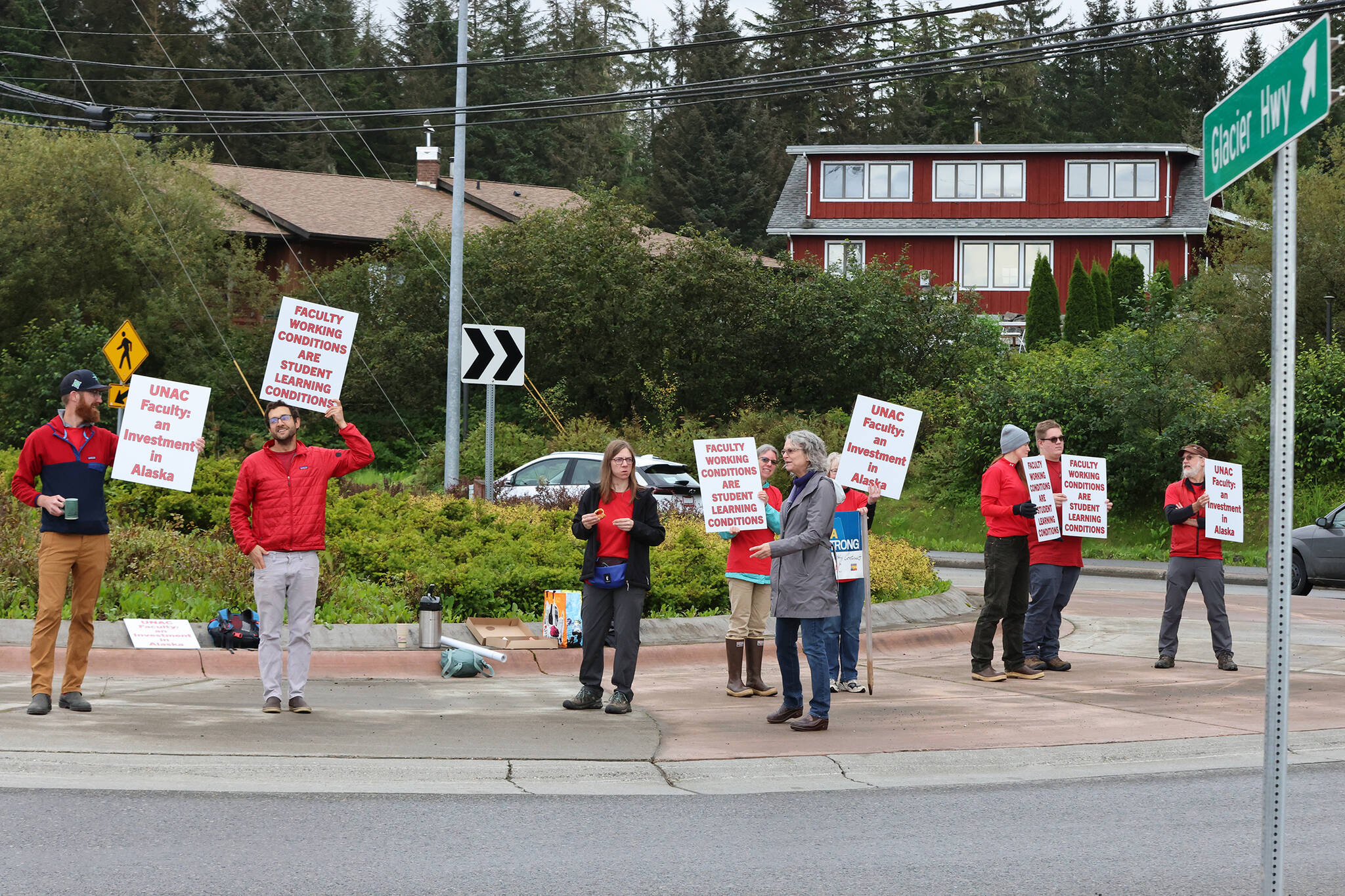 UNAC members and supporters rally near the University of Alaska Southeast campus in Juneau on Thursday, Sept. 9, (Ben Hohenstatt / Juneau Empire)