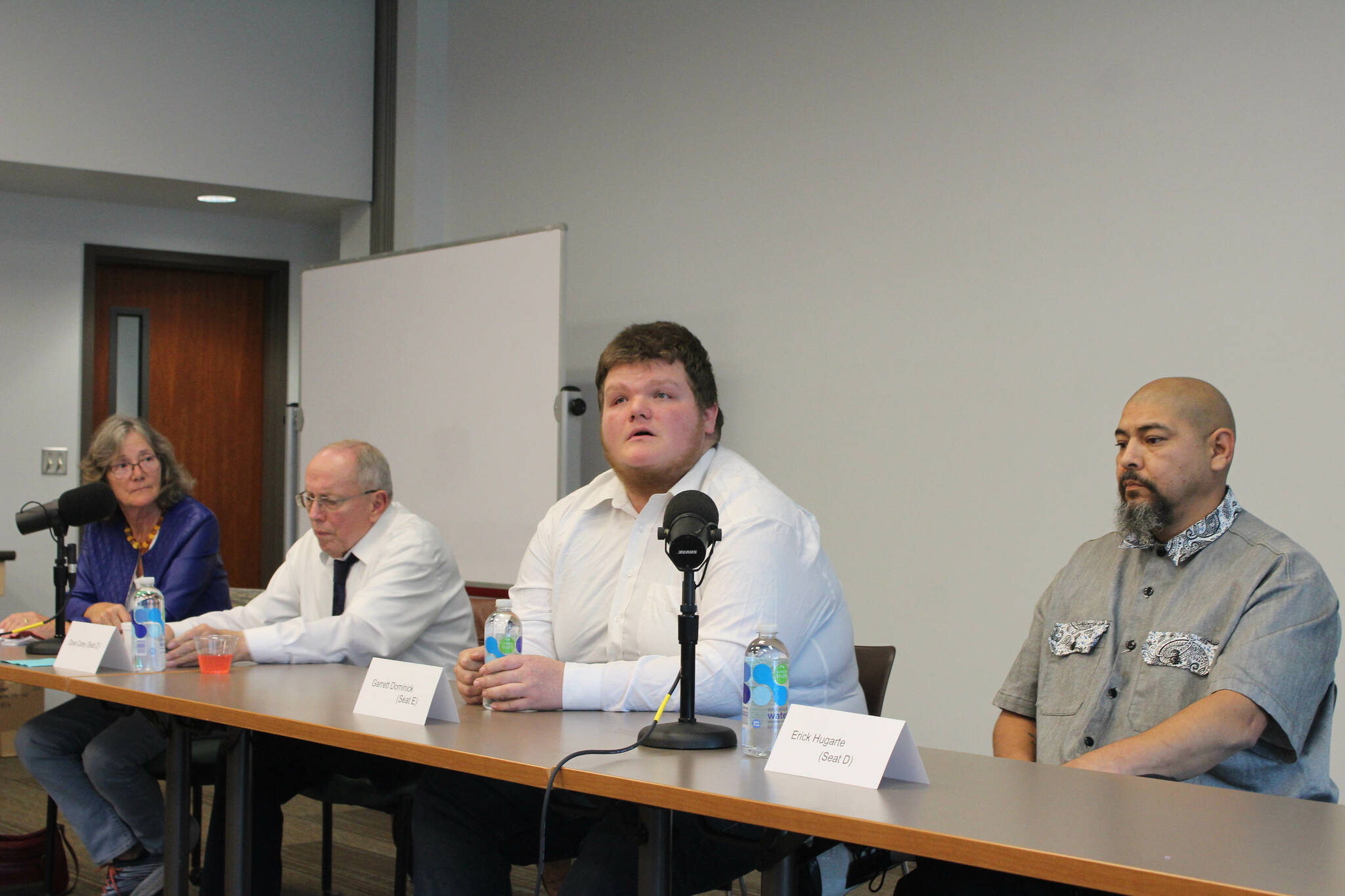 From left, Soldotna City Council candidates Lisa Parker, Dave Carey, Garrett Dominick and Erick Hugarte participate in a candidate forum at the Soldotna Public Library on Tuesday, Sept. 6, 2022, in Soldotna, Alaska. (Ashlyn O’Hara/Peninsula Clarion)