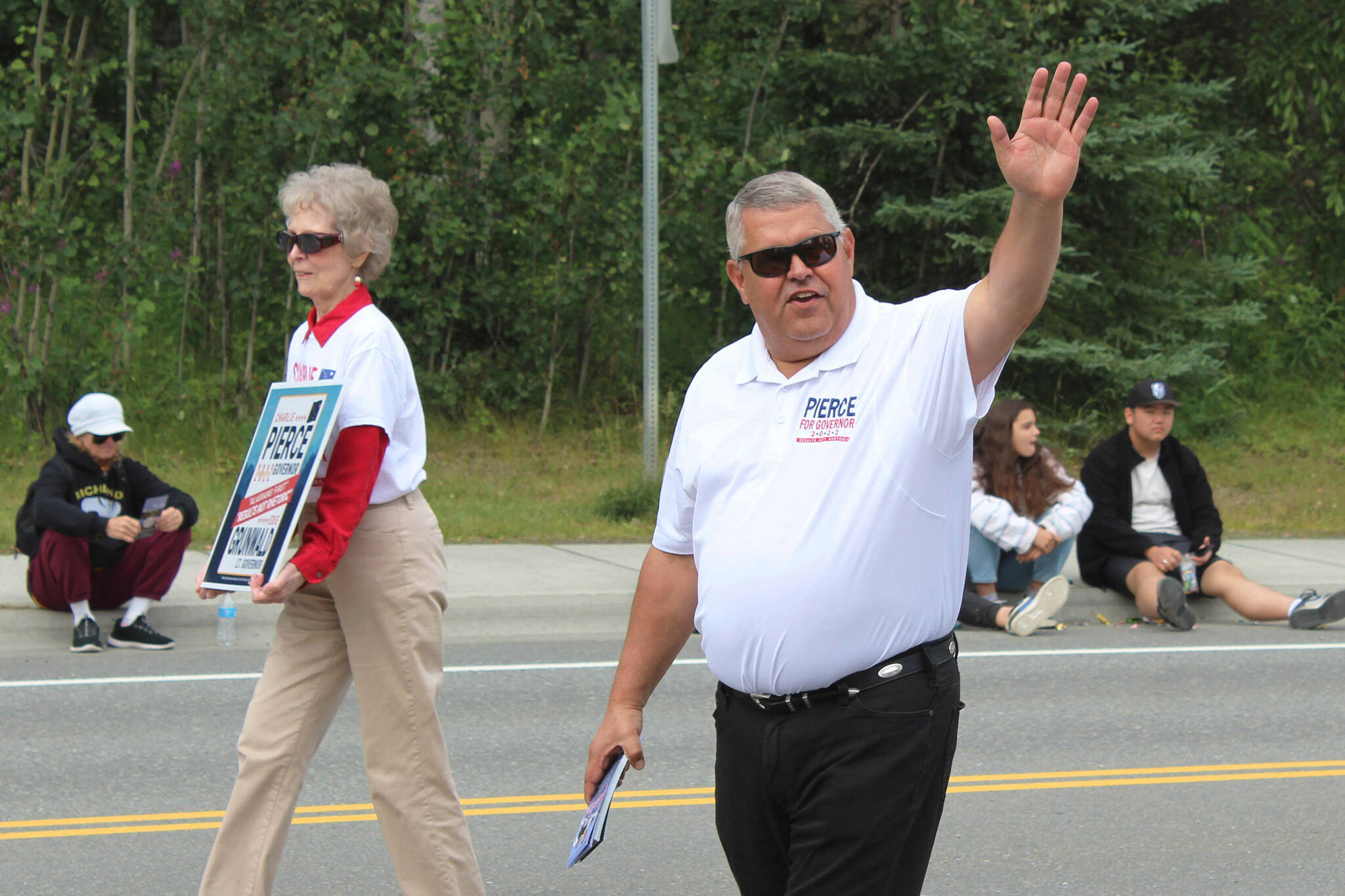 Kenai Peninsula Borough Mayor Charlie Pierce campaigns for governor as he walks in the 65th annual Soldotna Progress Days Parade on Saturday, July 23, 2022 in Soldotna, Alaska. Pierce resigned as borough mayor effective Sept. 30, 2022, to focus on his gubernatorial campaign. (Ashlyn O’Hara/Peninsula Clarion)