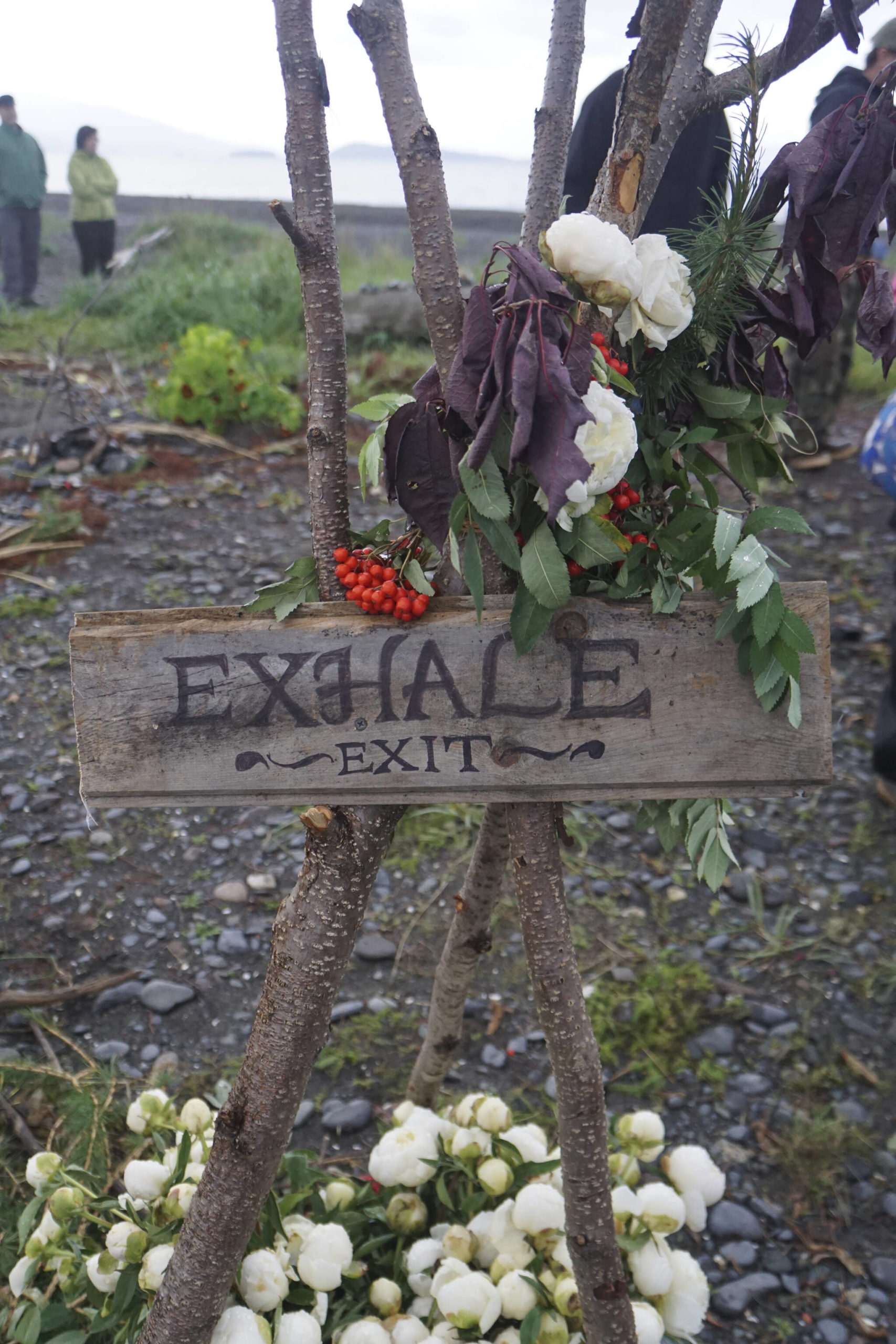 A sign marks the exit to the labyrinth at the 19th annual Burning Basket, “Breathe,” on Sunday, Sept. 11, 2022, at Mariner Park on the Homer Spit in Homer, Alaska. (Photo by Michael Armstrong/Homer News)