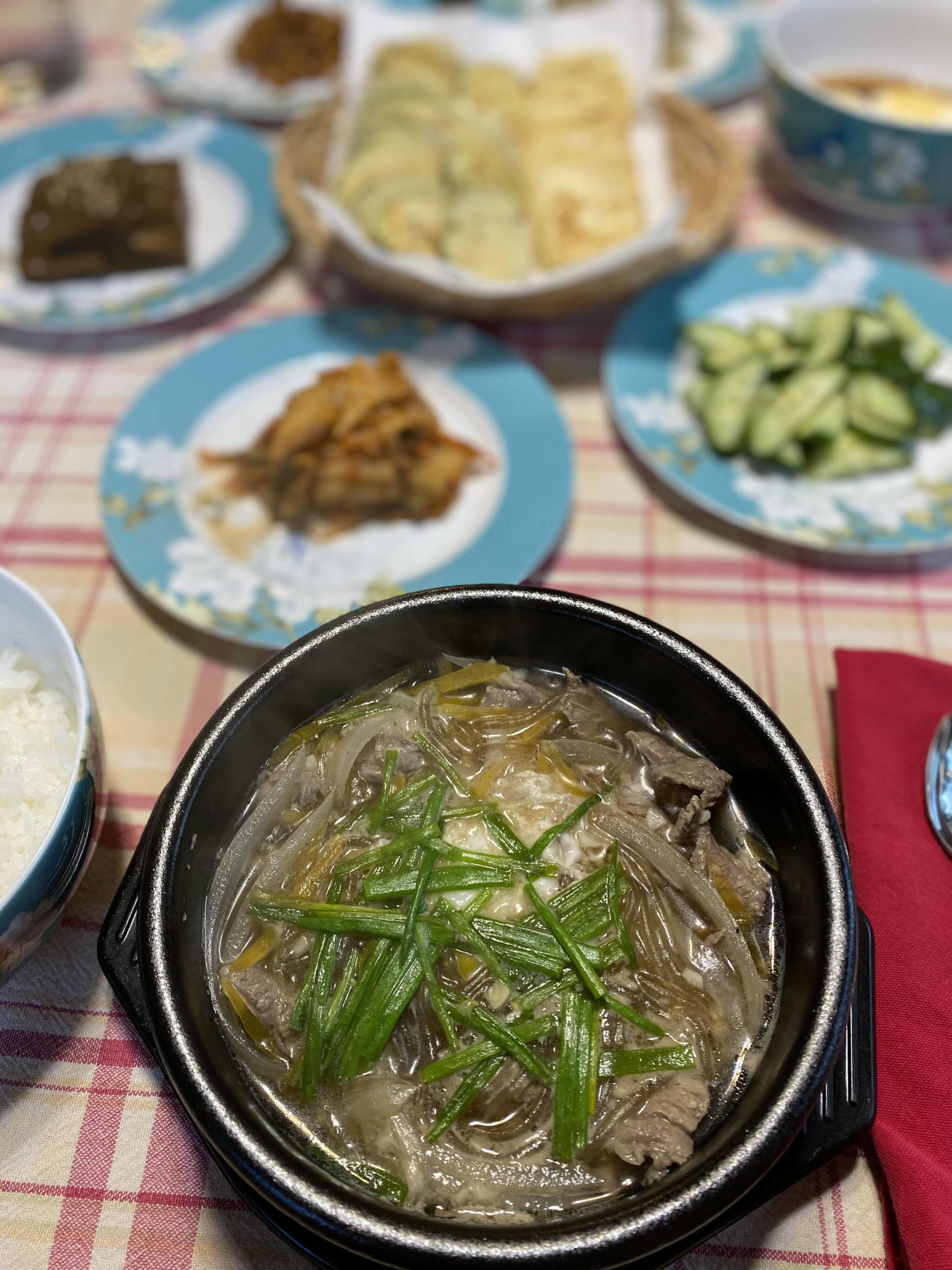 Bulkogi Stew, a mixture of beef steak, potato starch noodles, green onions and broth, is enjoyed as part of the Korean harvest festival, Chuseok. (Photo by Tressa Dale/Peninsula Clarion)