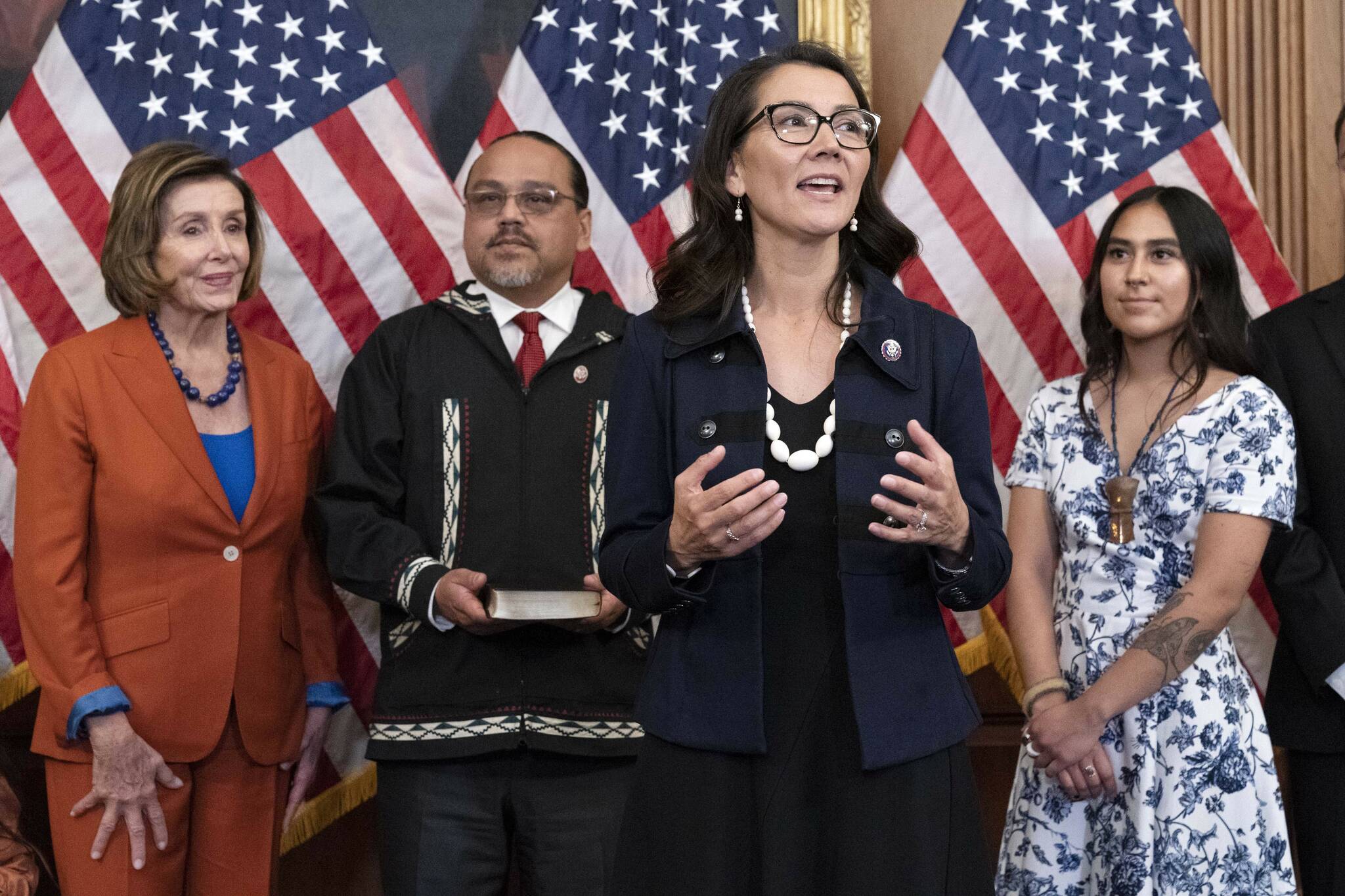 Rep. Mary Peltola, D-Alaska, accompanied by Speaker of the House Nancy Pelosi of Calif., and family members, speaks to the media right after the ceremonial swearing-in on Capitol Hill in Washington, Tuesday, Sept. 13, 2022. ( AP Photo/Jose Luis Magana)