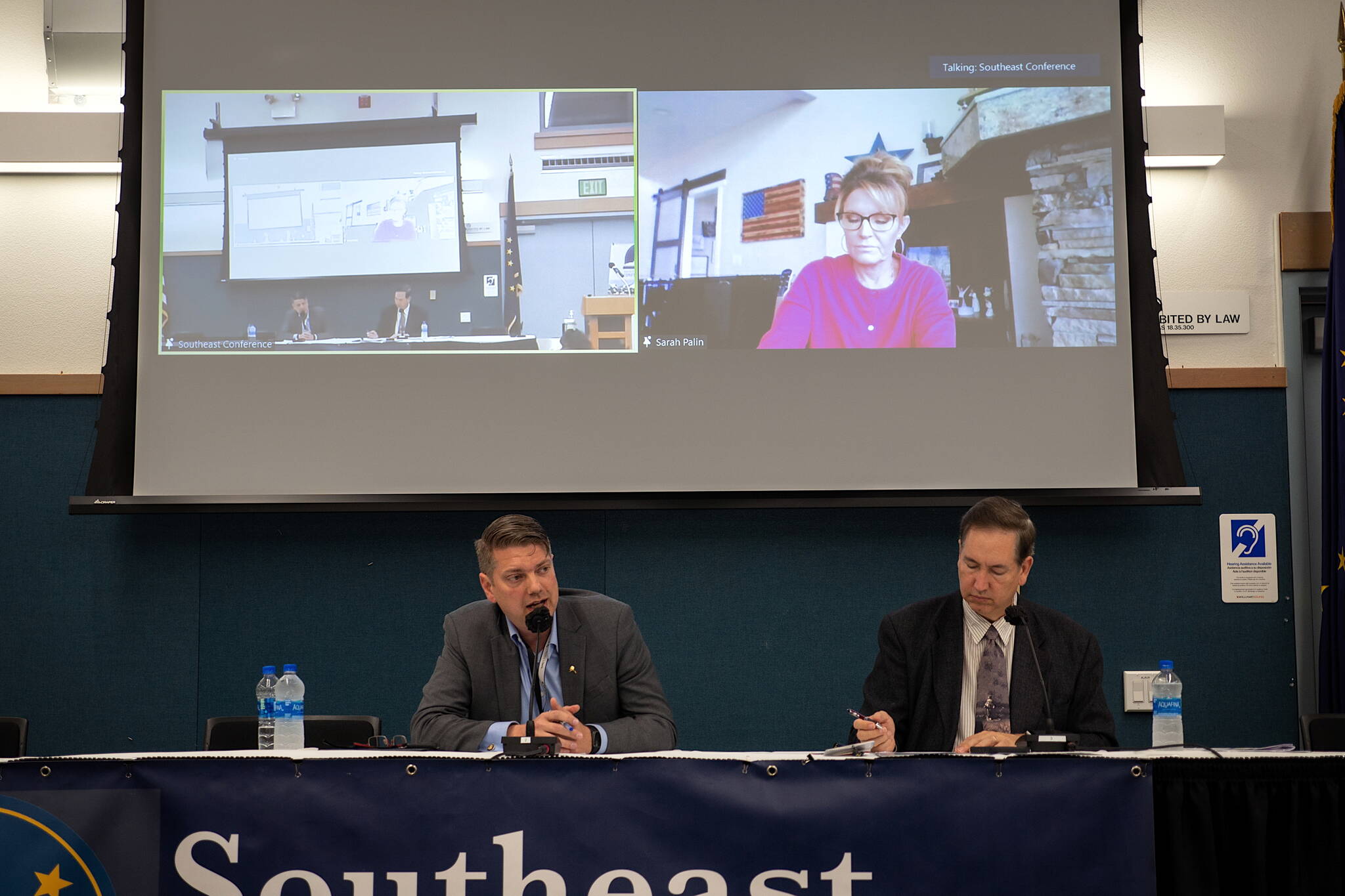 Republican Nick Begich, left, responds to a question at Thursday’s candidate forum for Alaska’s U.S. House candidates, hosted by Southeast Conference in Ketchikan. Republican Sarah Palin participated in the forum by teleconference. Southeast Conference Executive Director Robert Venables, right, acted as the moderator of the forum. Incumbent Democratic Rep. Mary Peltola was unable to participate in the forum but briefly provided an update to conference attendees remotely later in the day. (Sam Stockbridge / Ketchikan Daily News)