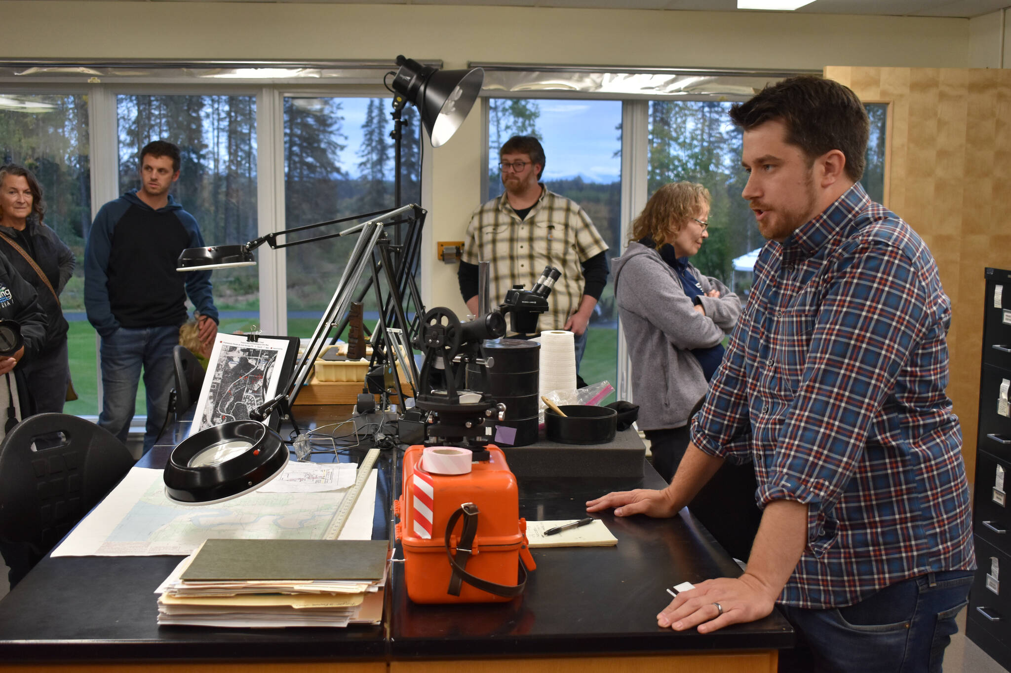 Dr. Adam Dunstan, Assistant Professor of Anthropology at Kenai Peninsula College, gives a tour of the newly dedicated Alan ‘Tiqutsex’ Boraas Anthropology Lab at KPC on Friday, Sept. 16, 2022, in Soldotna, Alaska. (Jake Dye/Peninsula Clarion)