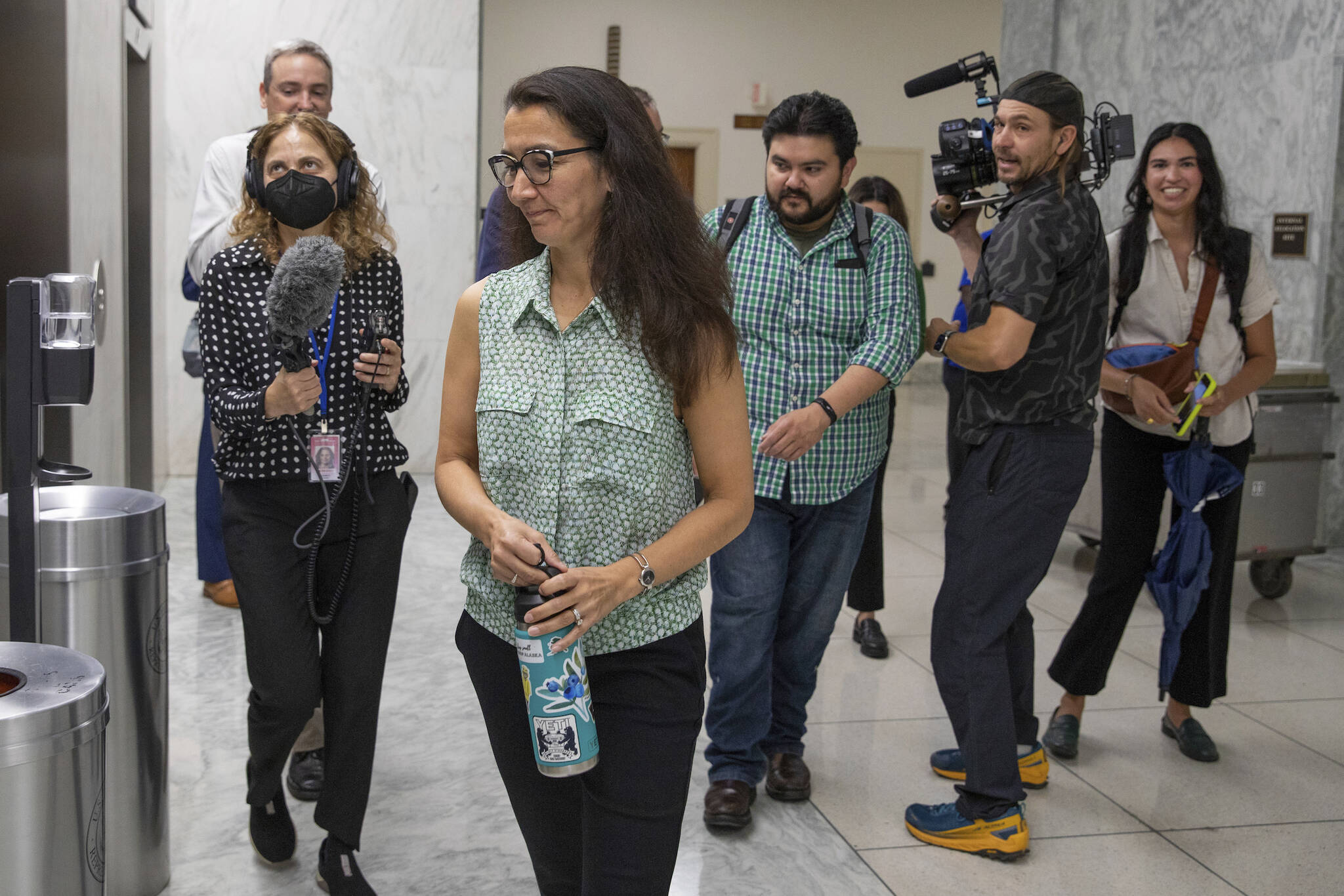 Rep. Mary Peltola, D-Alaska, is followed by her staff and members of the media at the U.S. Capitol in Washington on Monday, a day before she was sworn in after winning Alaska’s special election in August. As as result of her win she has since far outraised the two Republican challengers she will again face in the November general election. (AP Photo/Amanda Andrade-Rhoades)