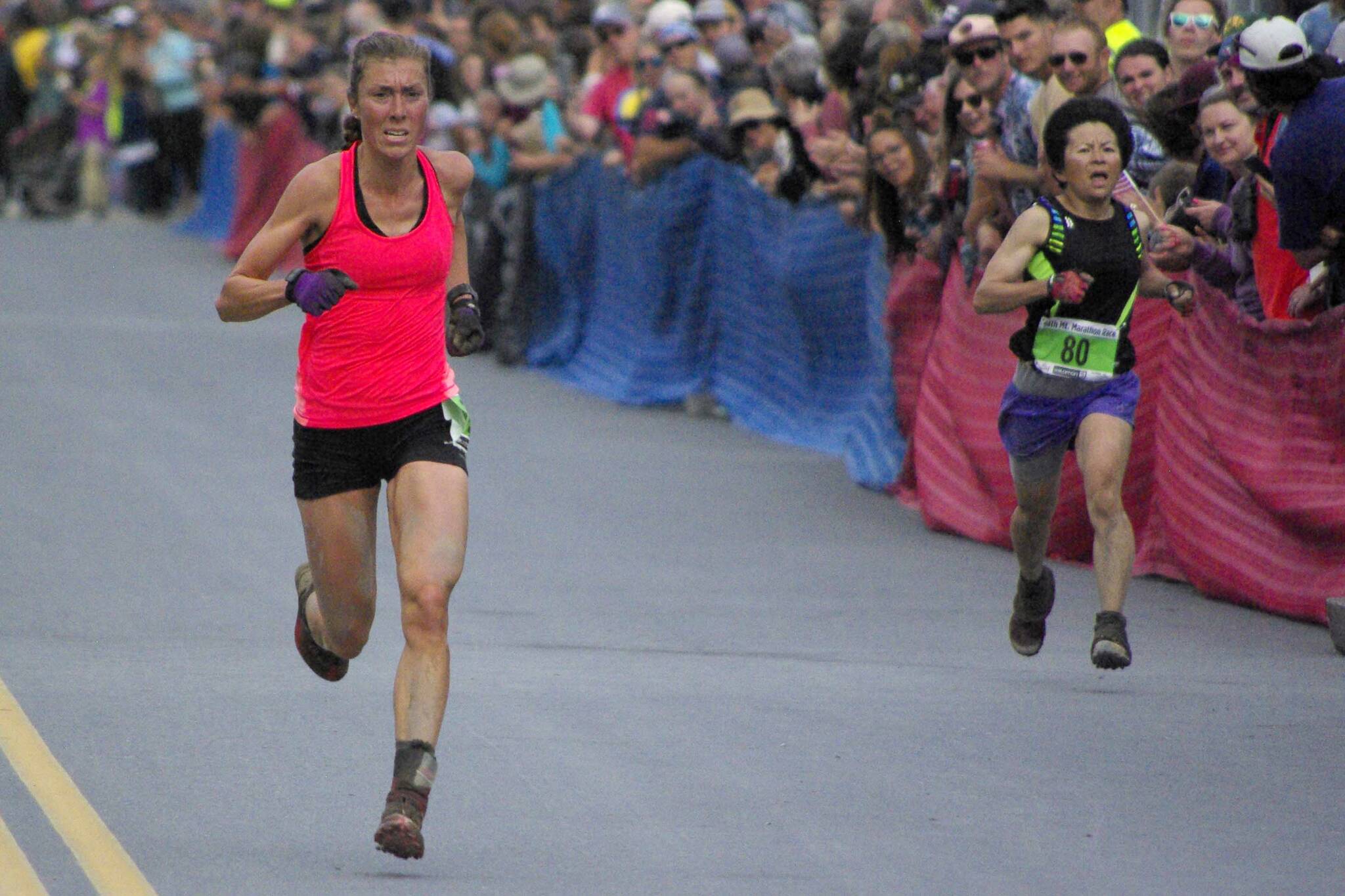 Palmer’s Christy Marvin and Palmer’s Meg Inokuma race in the Mount Marathon Race in Seward on July 4, 2022. (Photo by Jeff Helminiak/Peninsula Clarion)