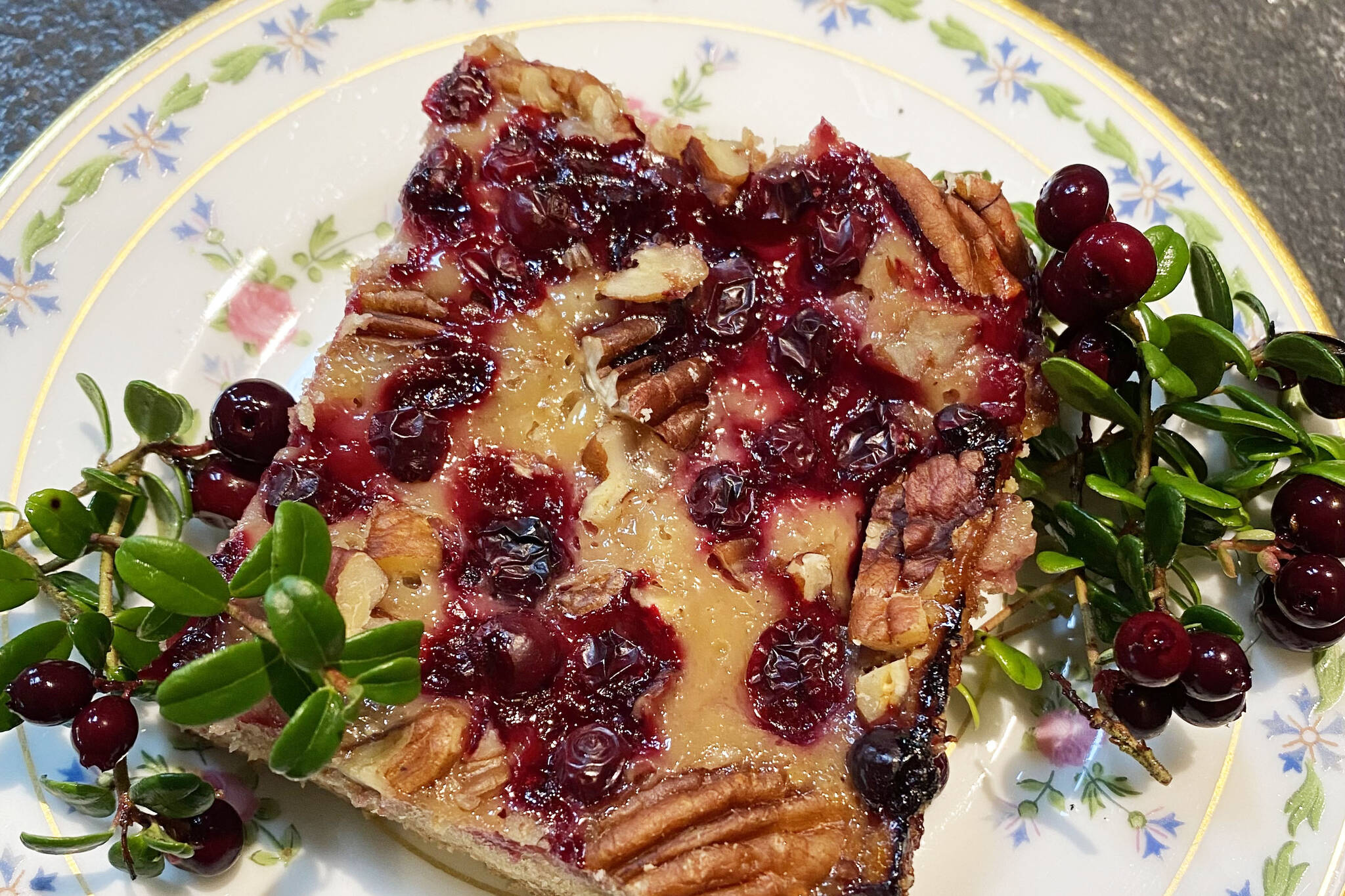 Sweet and tart cranberry pecan oat bars are photographed. (Photo by Tressa Dale/Peninsula Clarion)