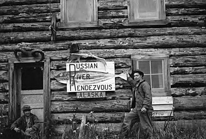 Ready to go fishing, a pair of guests pose in front of the Russian River Rendezvous in the early 1940s. (Robert C. Lewis photo courtesy of the Alaska Digital Archives)