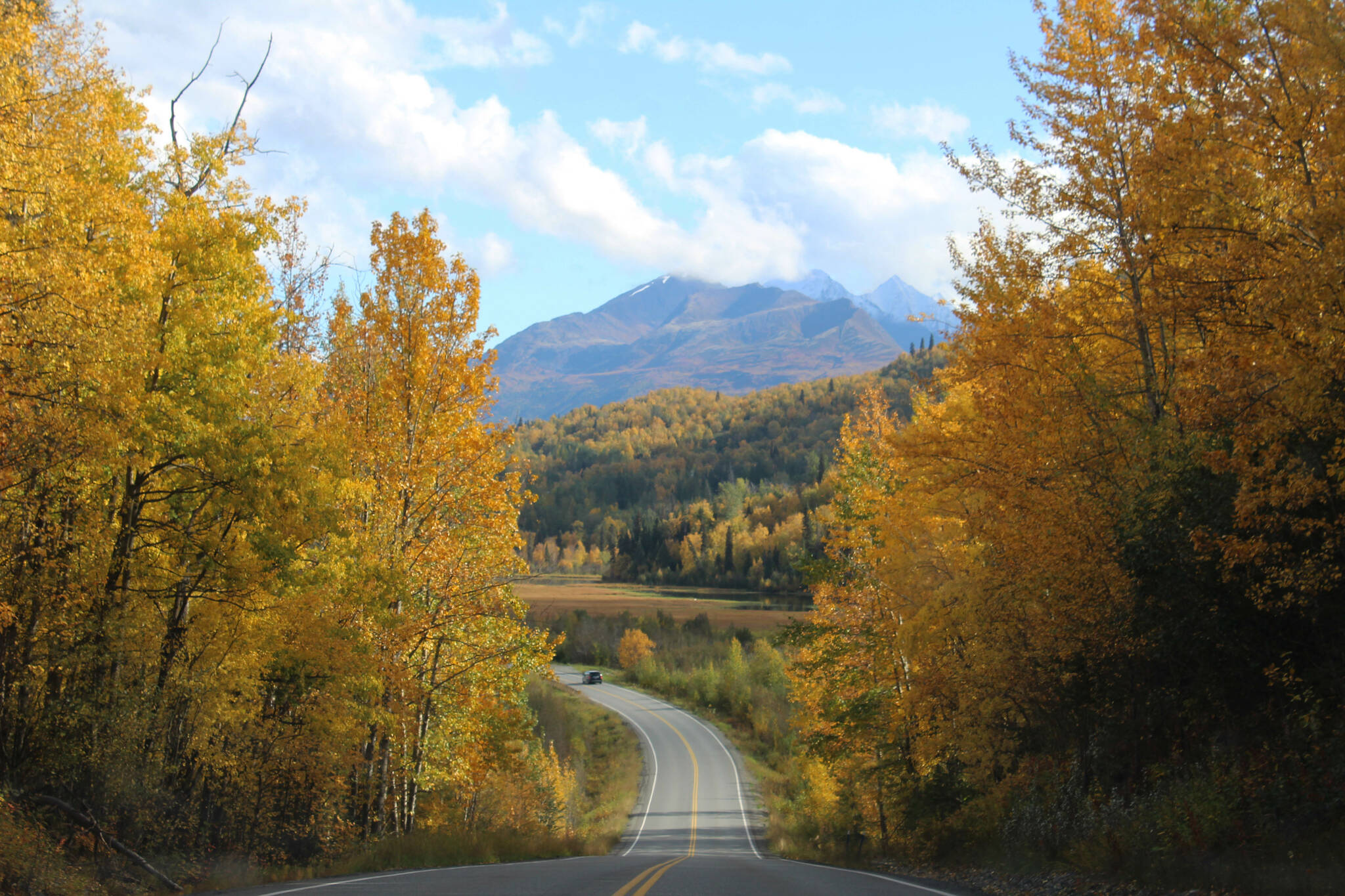 Fall colors frame Knik River Road on Saturday, Sept. 16, 2022 in Knik River, Alaska. (Ashlyn O'Hara/Peninsula Clarion)