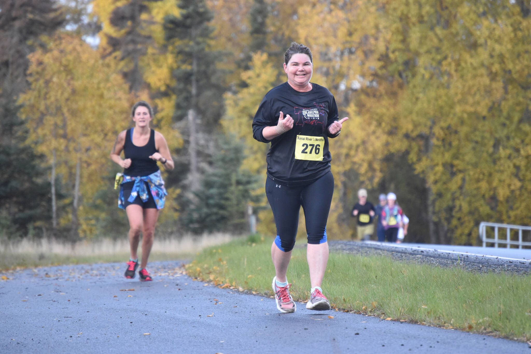 Deann Denter runs to 13th in the women’s half marathon on Sunday, Sept. 25, 2022, at the Kenai River Marathon in Kenai, Alaska. (Photo by Jeff Helminiak/Peninsula Clarion)