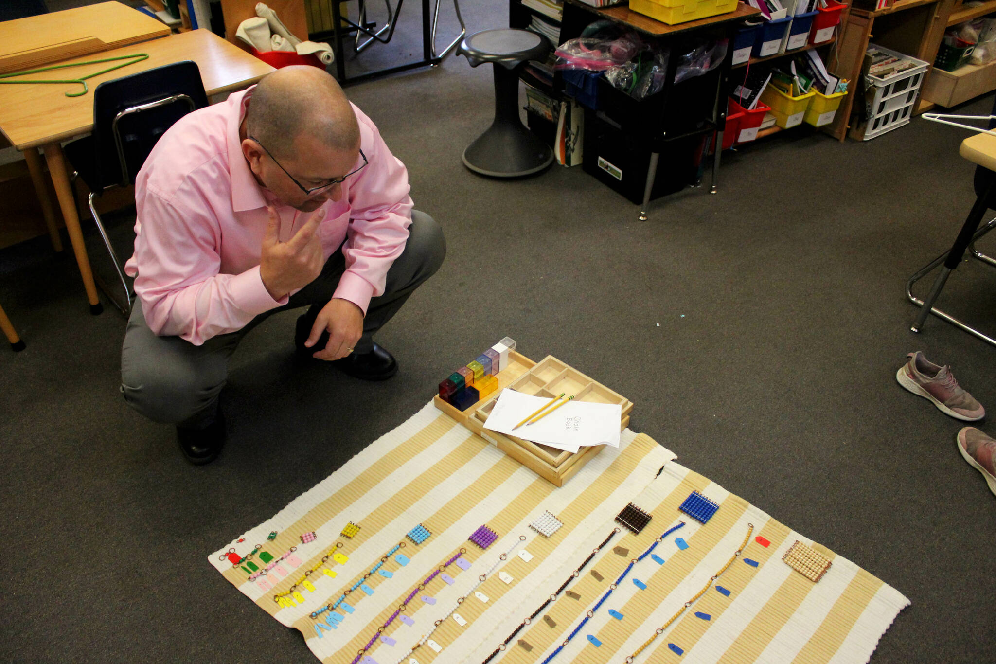 Soldotna Montessori Charter School Principal John DeVolld explains Montessori materials in a classroom at Soldotna Montessori Charter School on Tuesday, Sept. 20, 2022, in Soldotna, Alaska. (Ashlyn O’Hara/Peninsula Clarion)