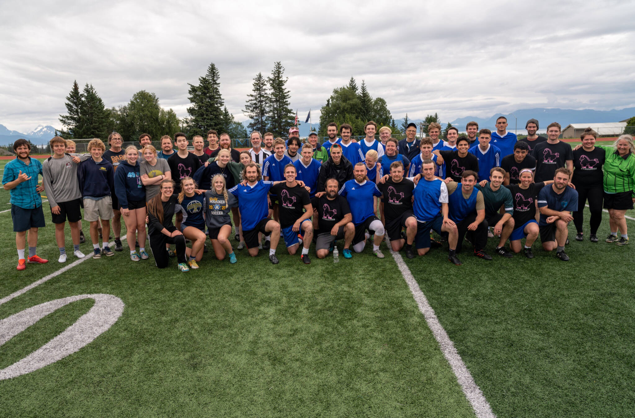 Community soccer players after a special match celebrating the life of Drew Brown at Homer High School Field on Sunday, Aug. 14, 2022. (Photo by Uliana Reutov)