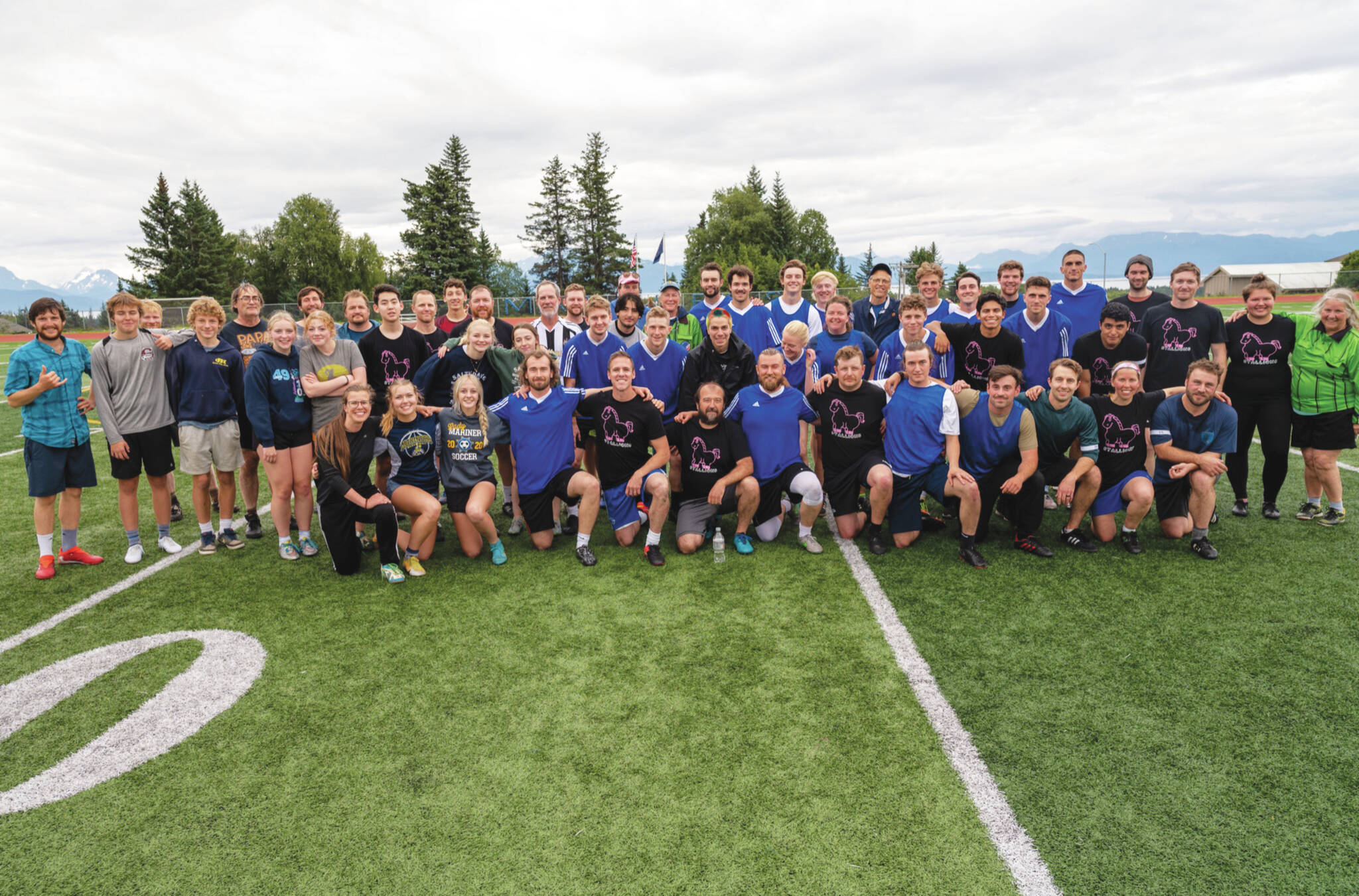 Community soccer players after a special match celebrating the life of Drew Brown at Homer High School Field on Sunday, Aug. 14, 2022. (Photo by Uliana Reutov)