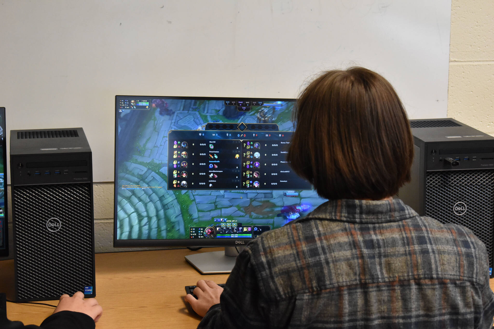 Kenai League of Legends player Cody Good checks team compositions at the start of a League of Legends match on Tuesday, Sept. 23, 2022, at Kenai Central High School in Kenai, Alaska. (Jake Dye/Peninsula Clarion)