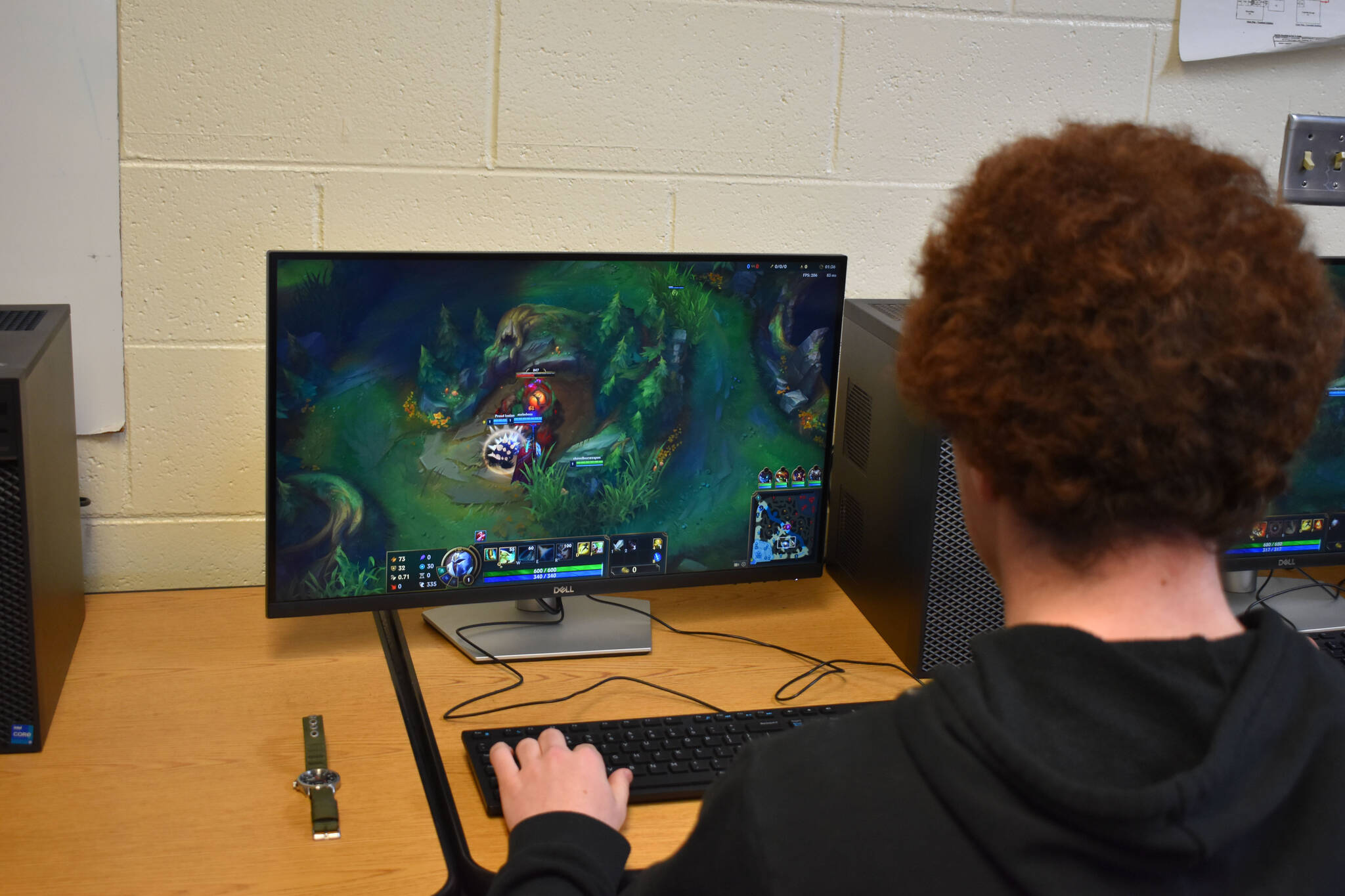 Kenai League of Legends team captain Silas Thibodeau fights a monster in the jungle during a match against Anchorage Christian Schools on Tuesday, Sept. 27, 2022, at Kenai Central High School in Kenai, Alaska. (Jake Dye/Peninsula Clarion)