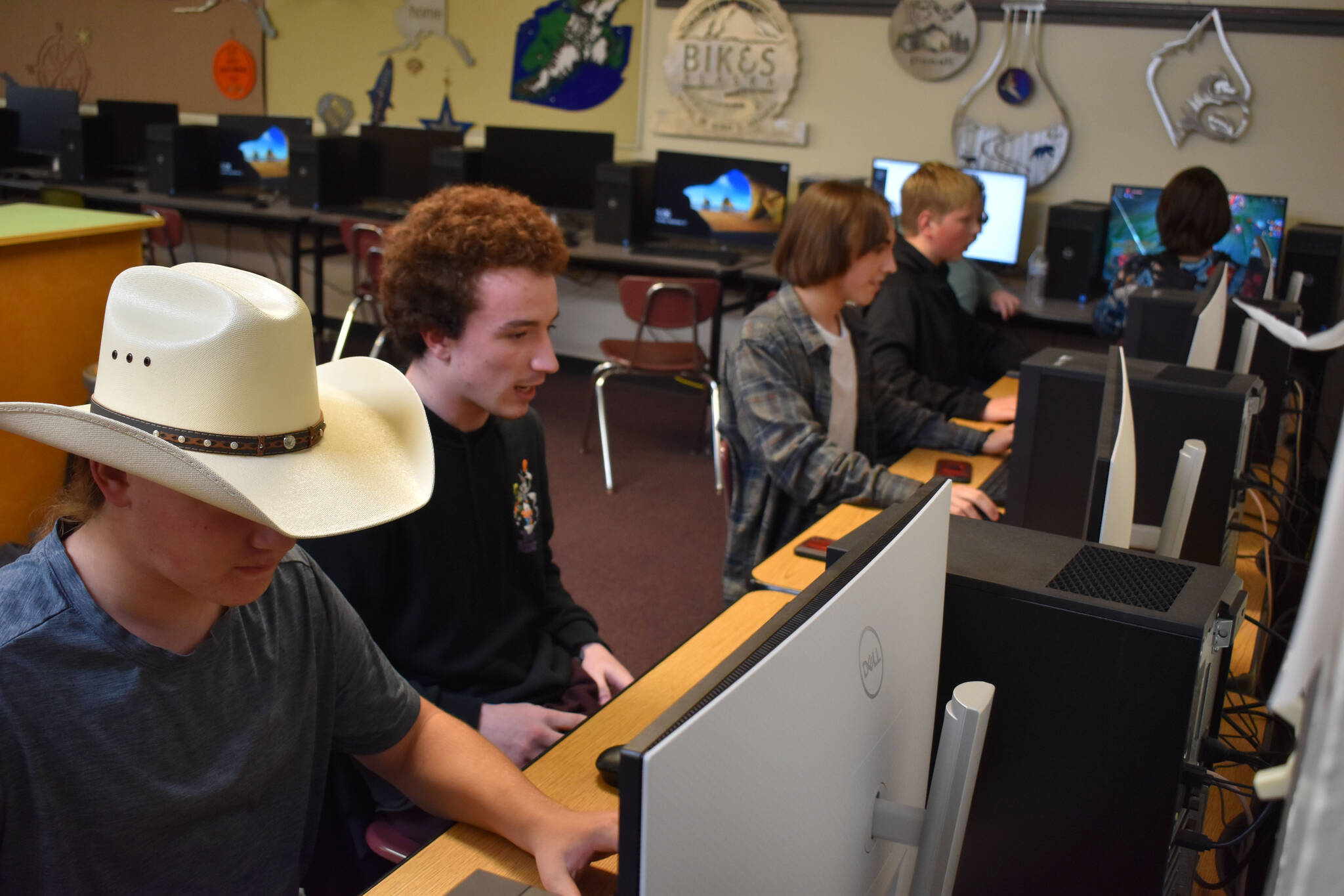 Dain Douthit, Silas Thibodeau, Cody Good, Roman Dunham and Jackson Anding compete for Kenai Central High School in a League of Legends match on Tuesday, Sept. 27, 2022, at Kenai Central High School in Kenai, Alaska. (Jake Dye/Peninsula Clarion)