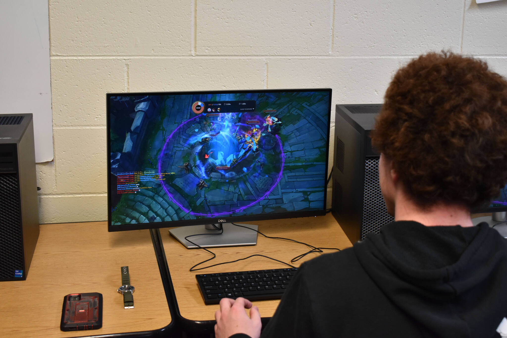 Kenai League of Legends team captain Silas Thibodeau watches the defeat animation as his nexus is destroyed during the first game on Tuesday, Sept. 27, 2022, at Kenai Central High School in Kenai, Alaska. (Jake Dye/Peninsula Clarion)