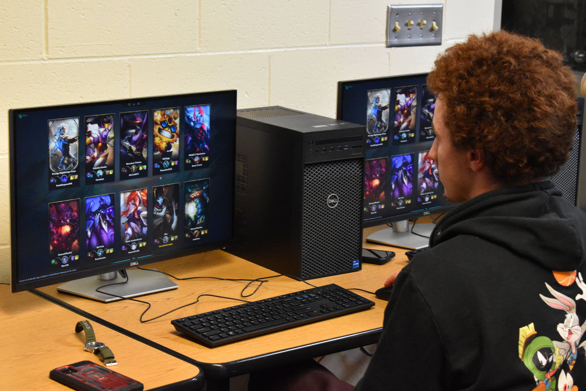 Kenai League of Legends team captain Silas Thibodeau waits for the second game to start during a match on Tuesday, Sept. 27, 2022, at Kenai Central High School in Kenai, Alaska. (Jake Dye/Peninsula Clarion)