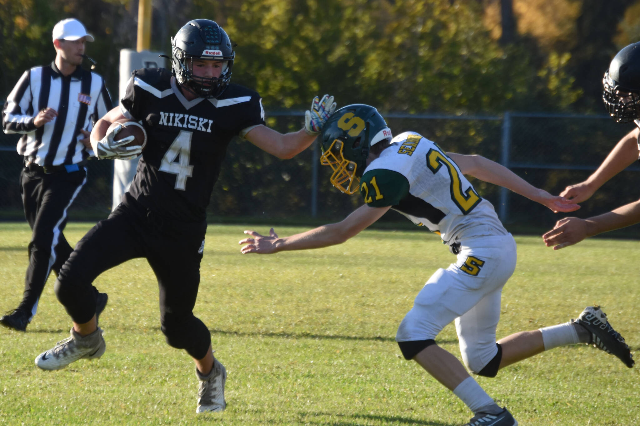 Nikiski's Oliver Parrish blocks Seward's Lane Peterson during the Denali Conference title match on Friday, Sept. 30, 2022 at Nikiski High School in Nikiski, Alaska. (Jake Dye/Peninsula Clarion)